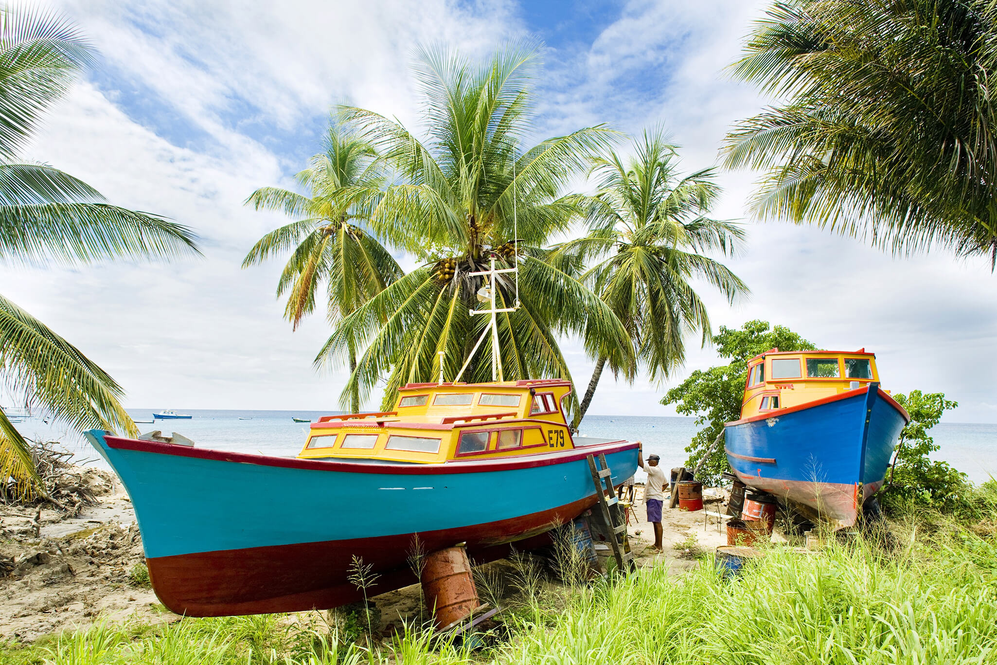A beach with two boats