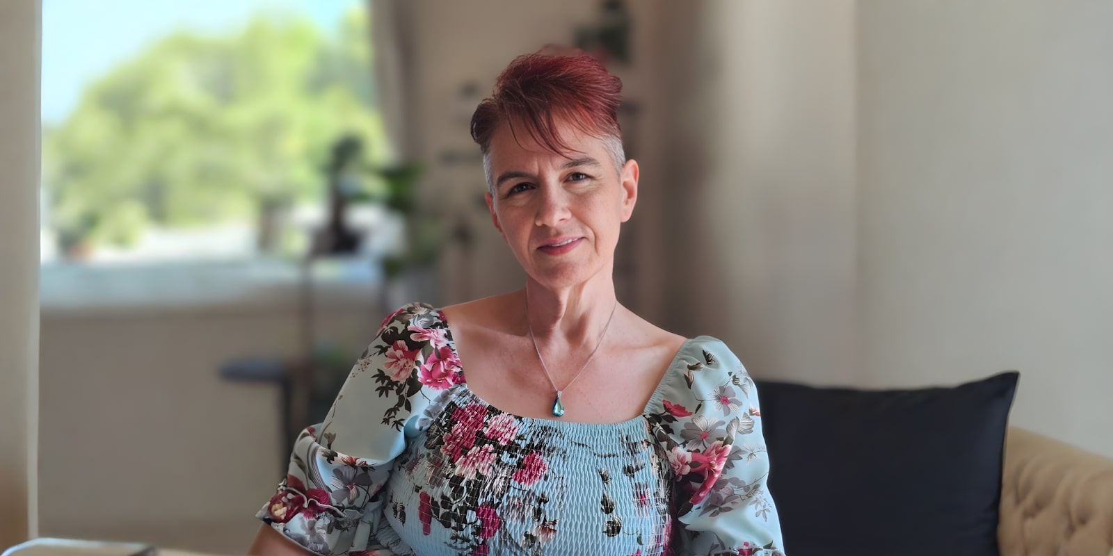 Lori Lynn Smith, a leader blending personal reinvention and strategy, exudes confidence and clarity in a professional setting.