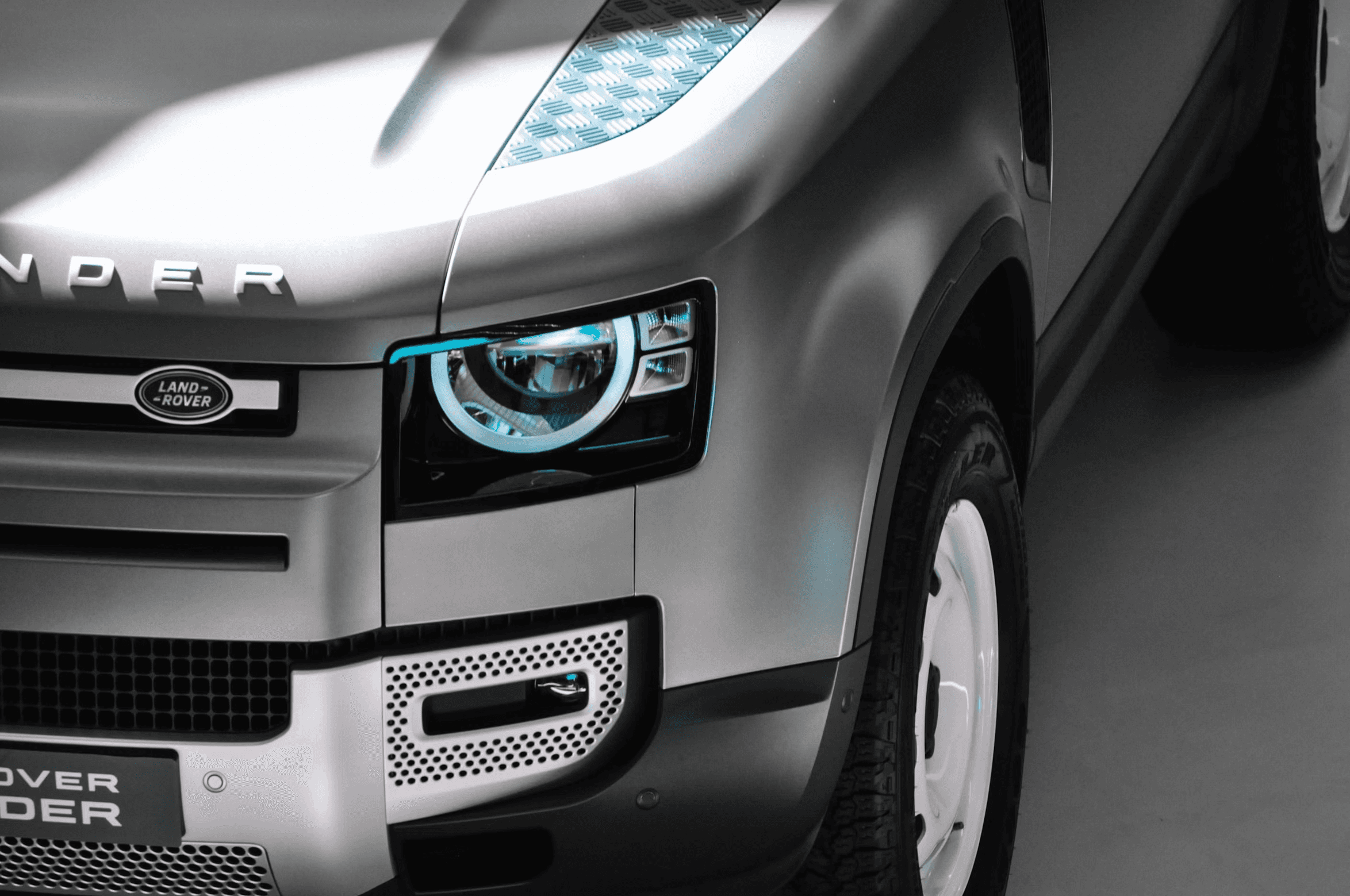 a close up of a car tire on a city street