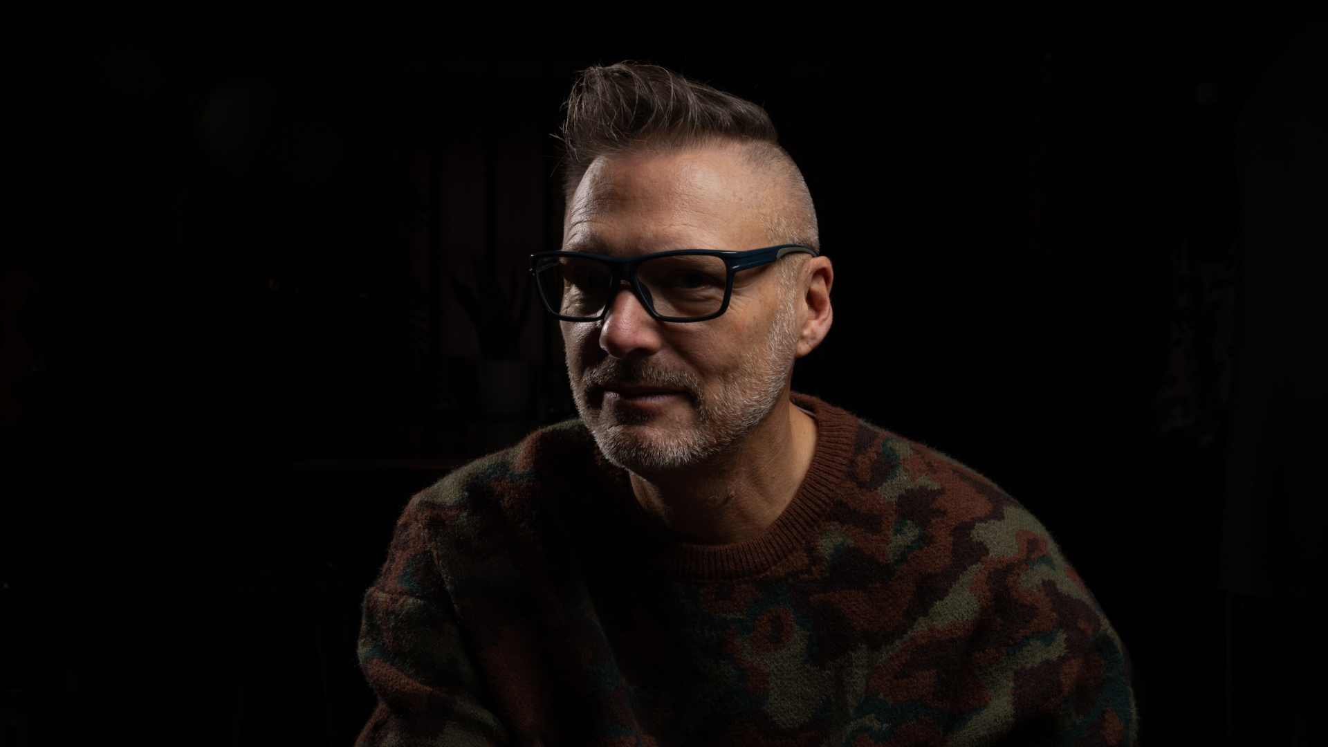 Portrait of Colin Melville, Creative Director and founder of COL AI, specializing in synthetic media and AI storytelling.