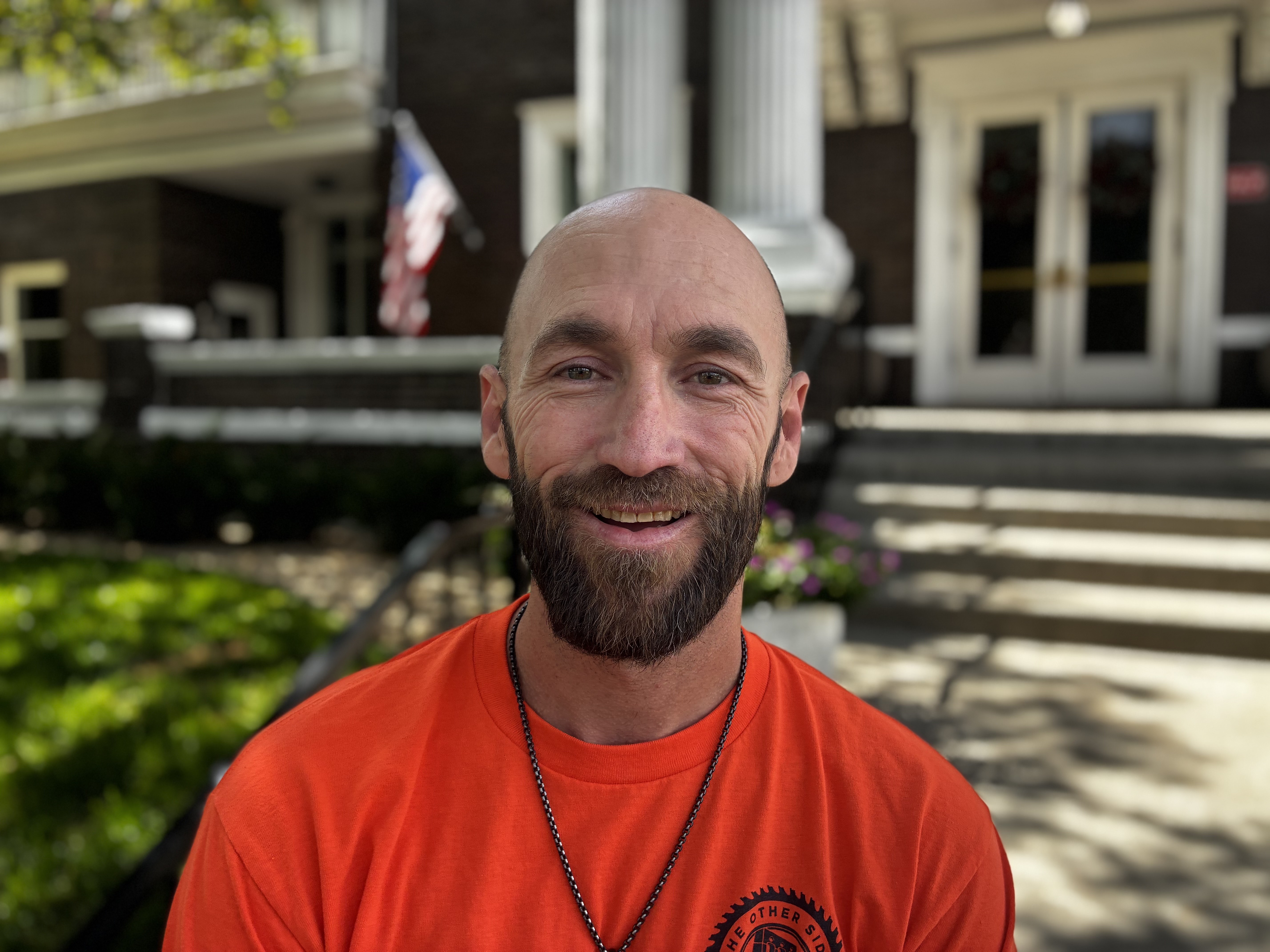 a man smiling for the camera