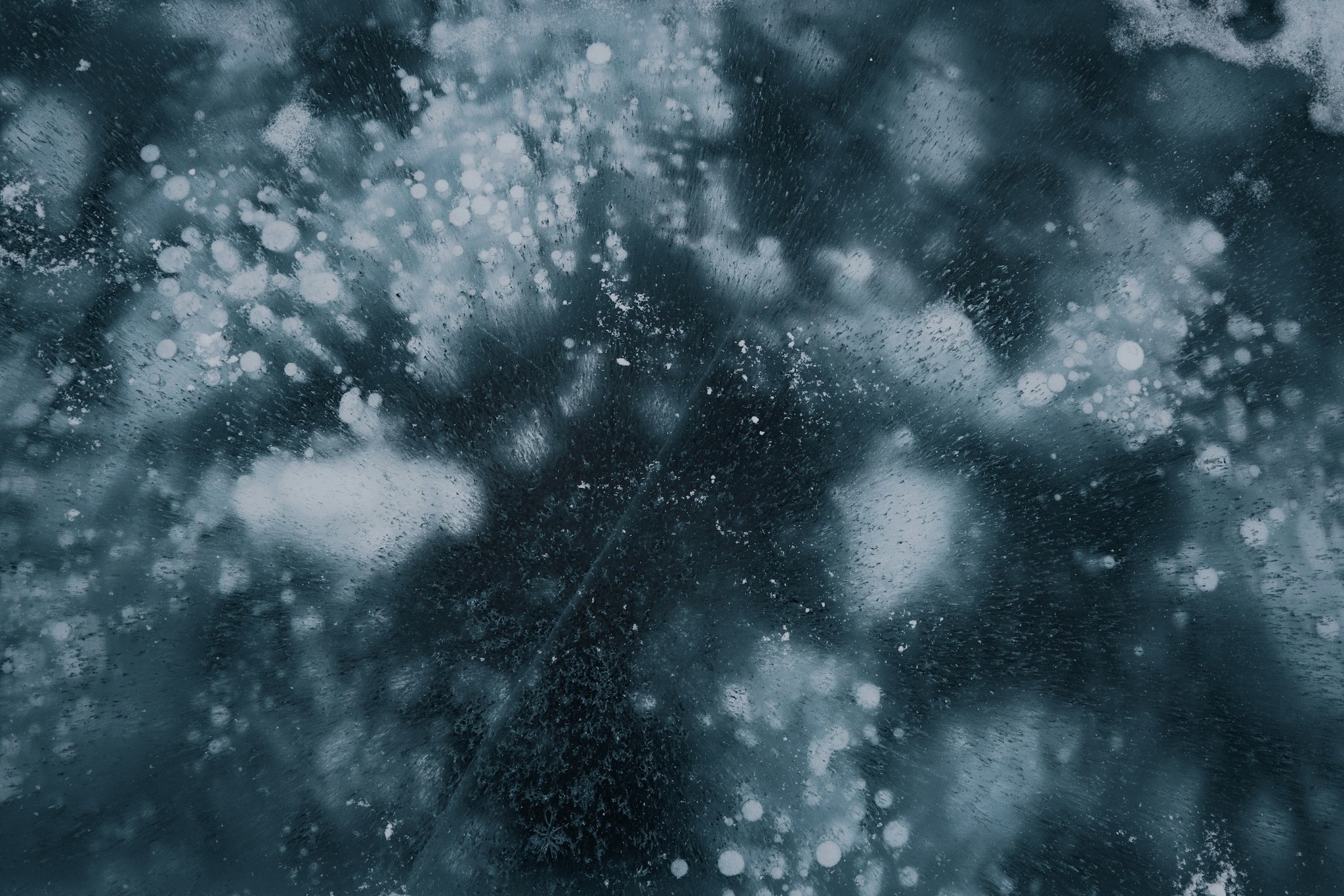 Abstract pattern of ice with bubbles