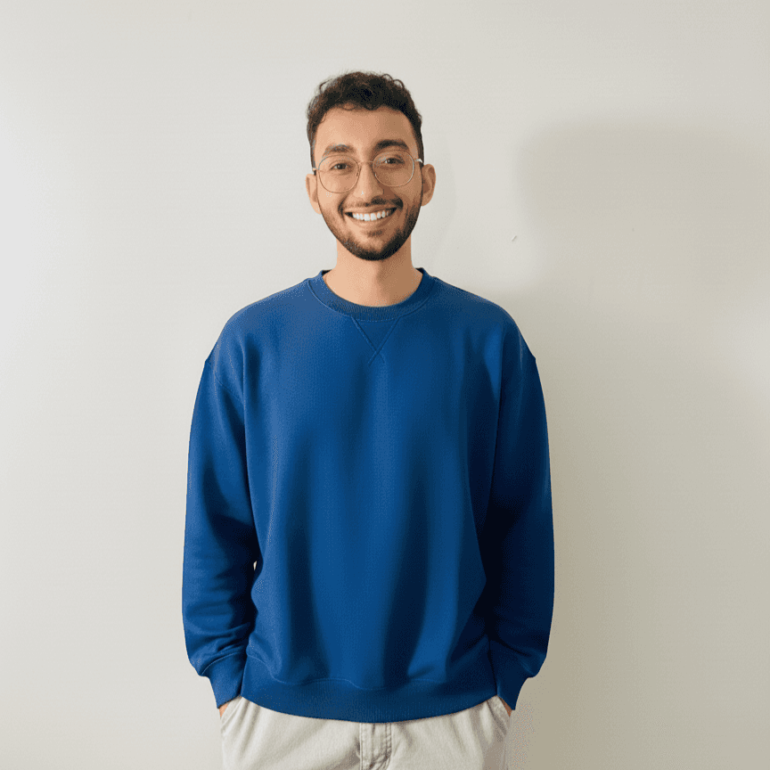 Visual designer in a minimalist studio with an iPad