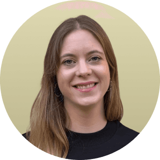 woman in white crew neck shirt smiling