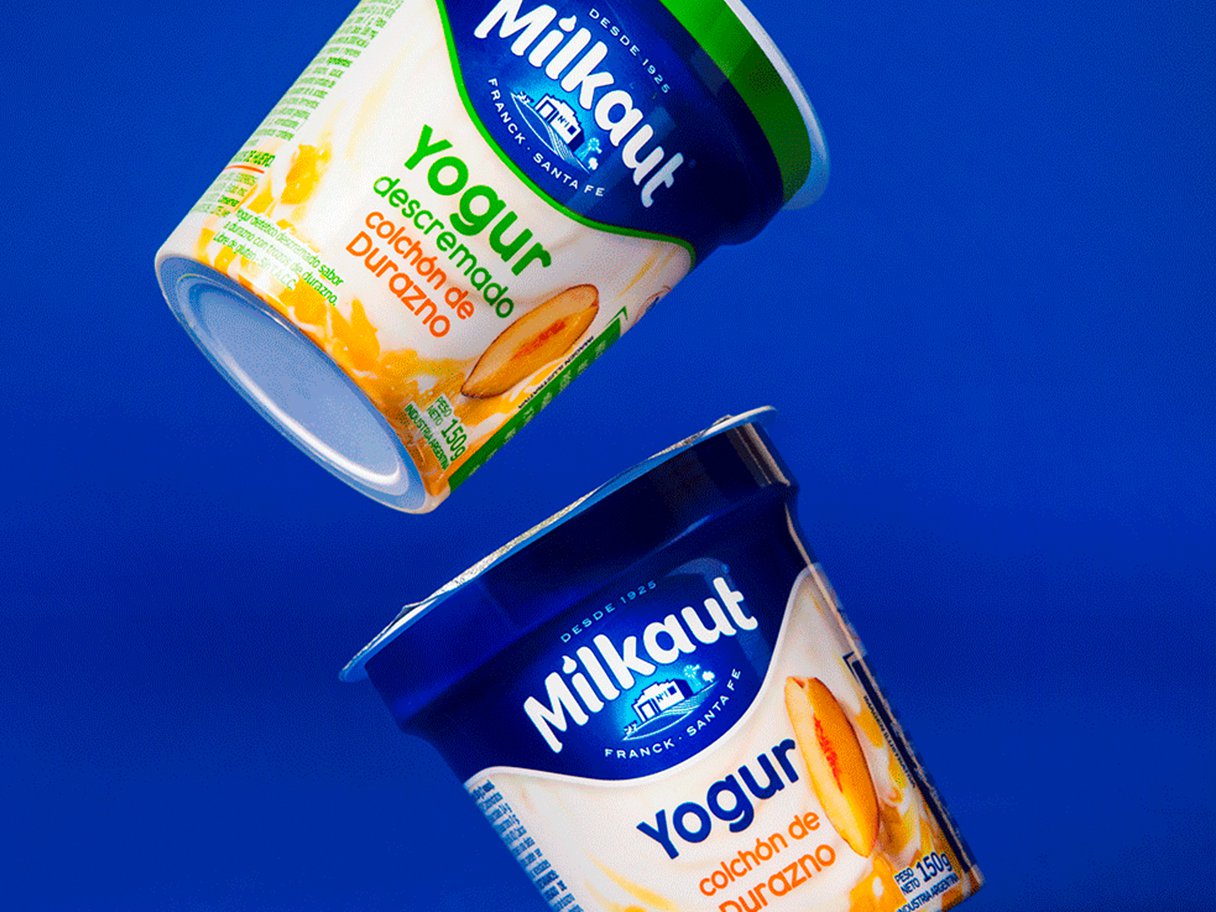 Rustic cabin in a golden field at sunset