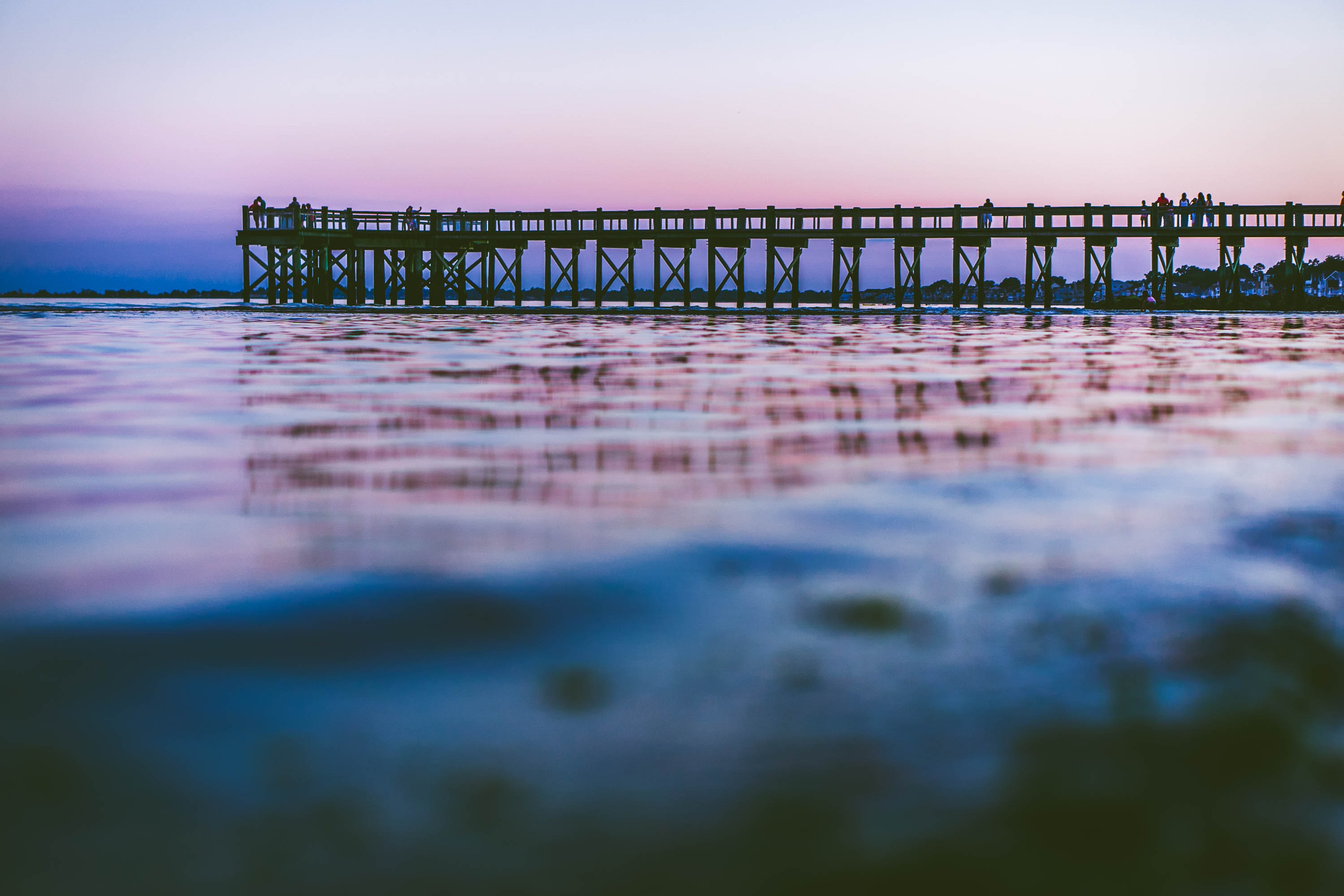 Purple sunset at Walnut Beach pier, Connecticut, USA