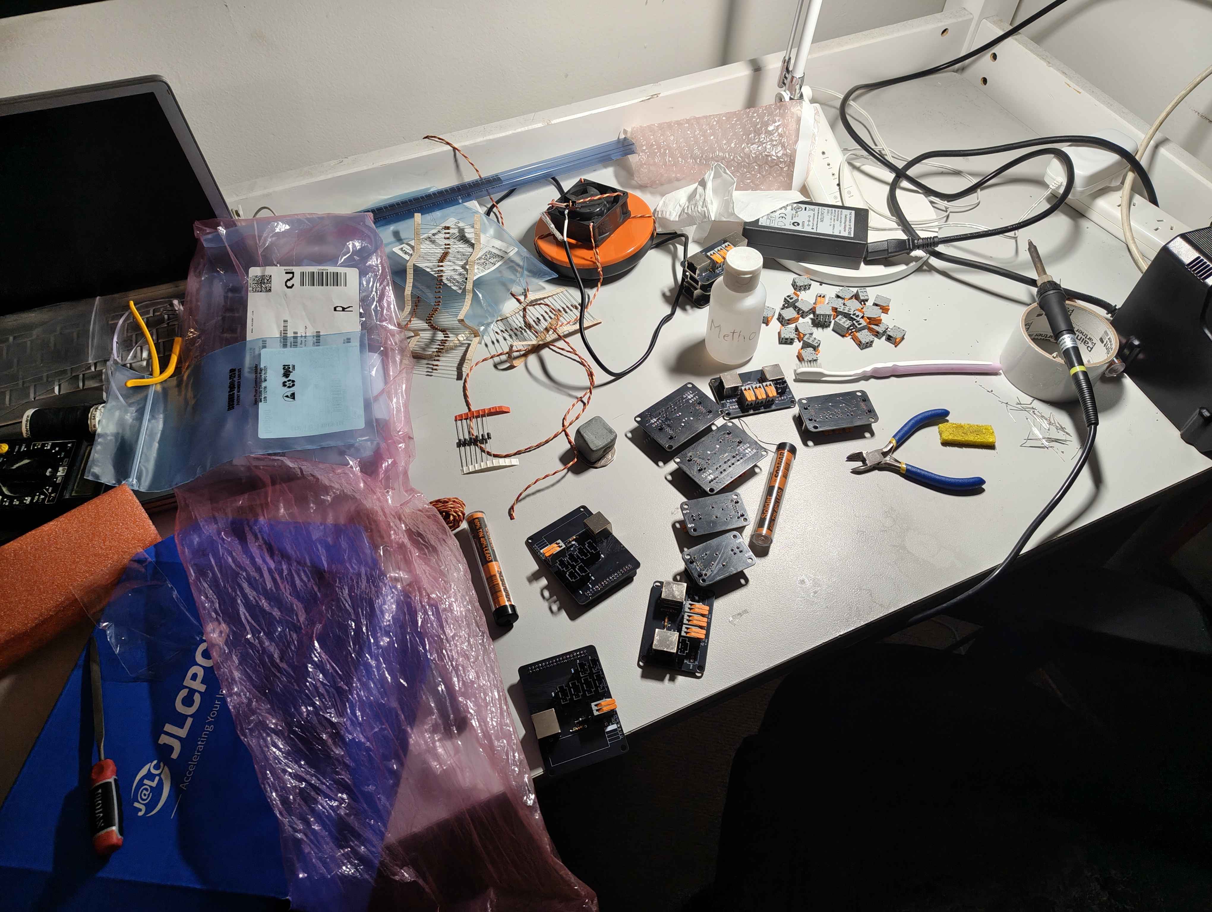 Desk containing our CAN pcbs in progress