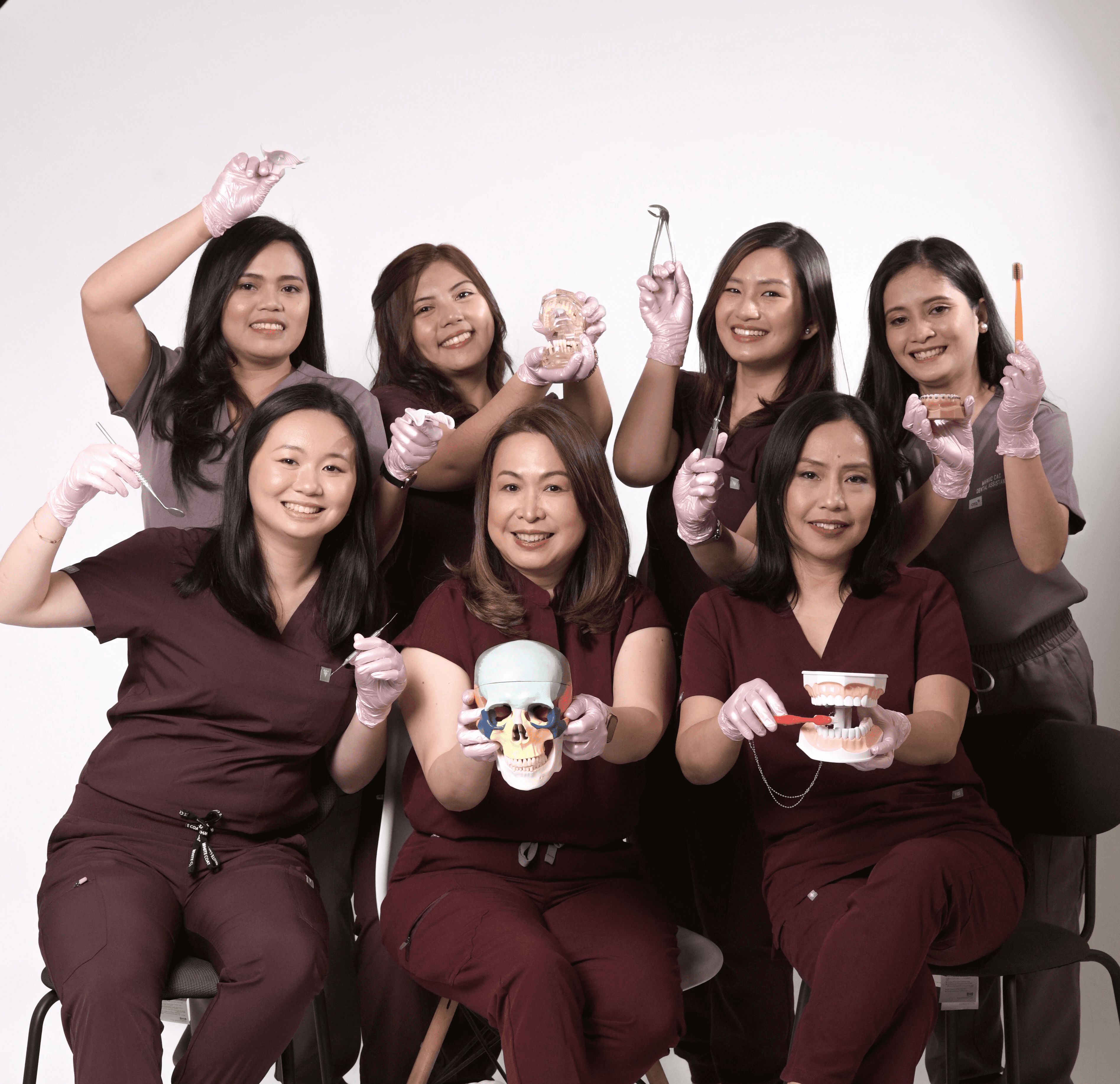 Dental team group photo with arts.