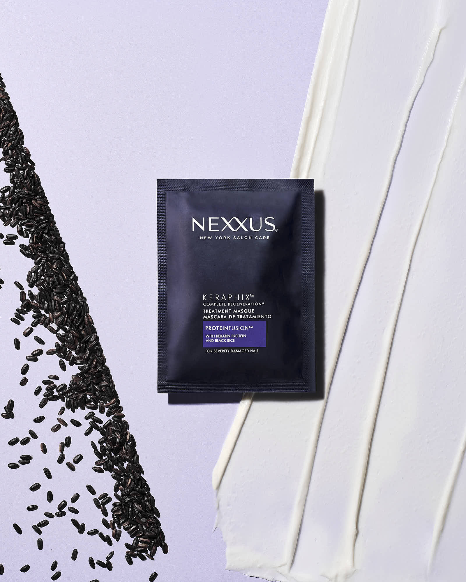 A black package with a purple design, placed against a light purple background with white textures.