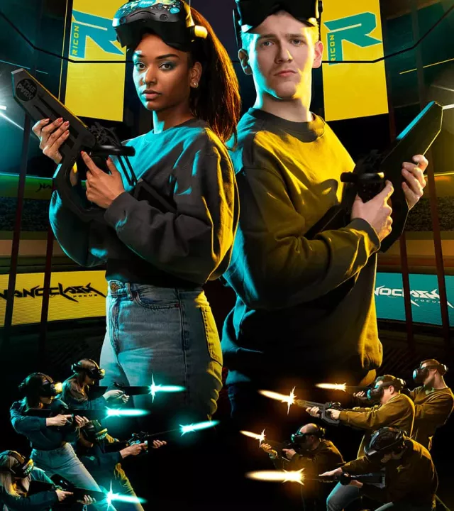 Two opposing teams of VR players holding futuristic blasters, facing off against blue and yellow team backdrops in a competitive shooter arena.