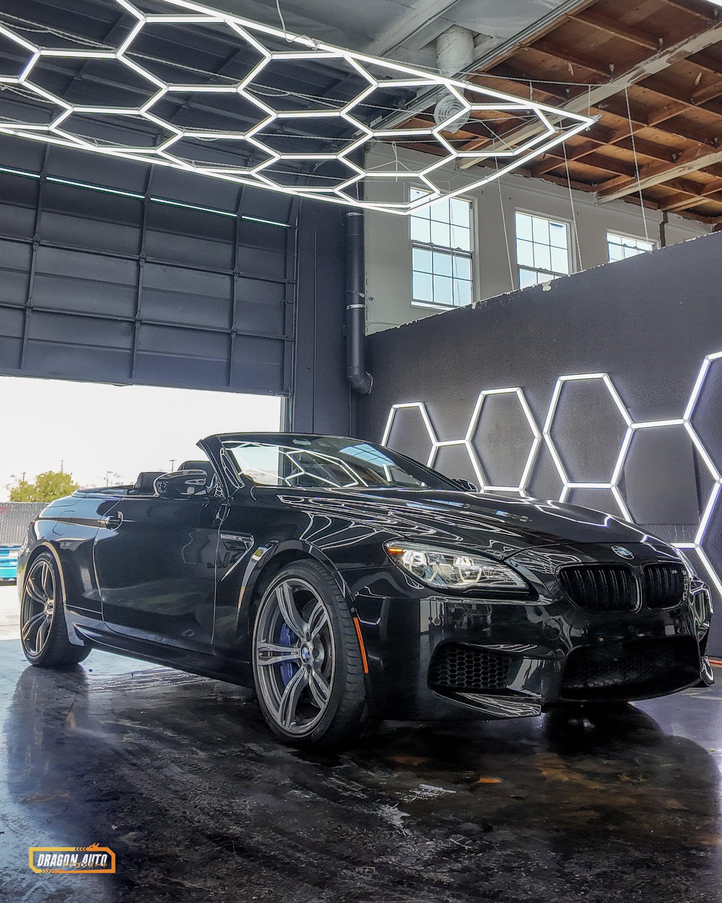 Black 2017 BMW M6 Convertible with Icon Rocklear paint protection, front 3/4, vertical, distinct wider ceiling framing, Dragon Auto Milpitas