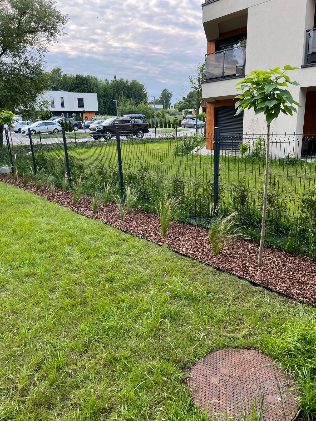 Beautiful landscaped garden with greenery and outdoor design elements.