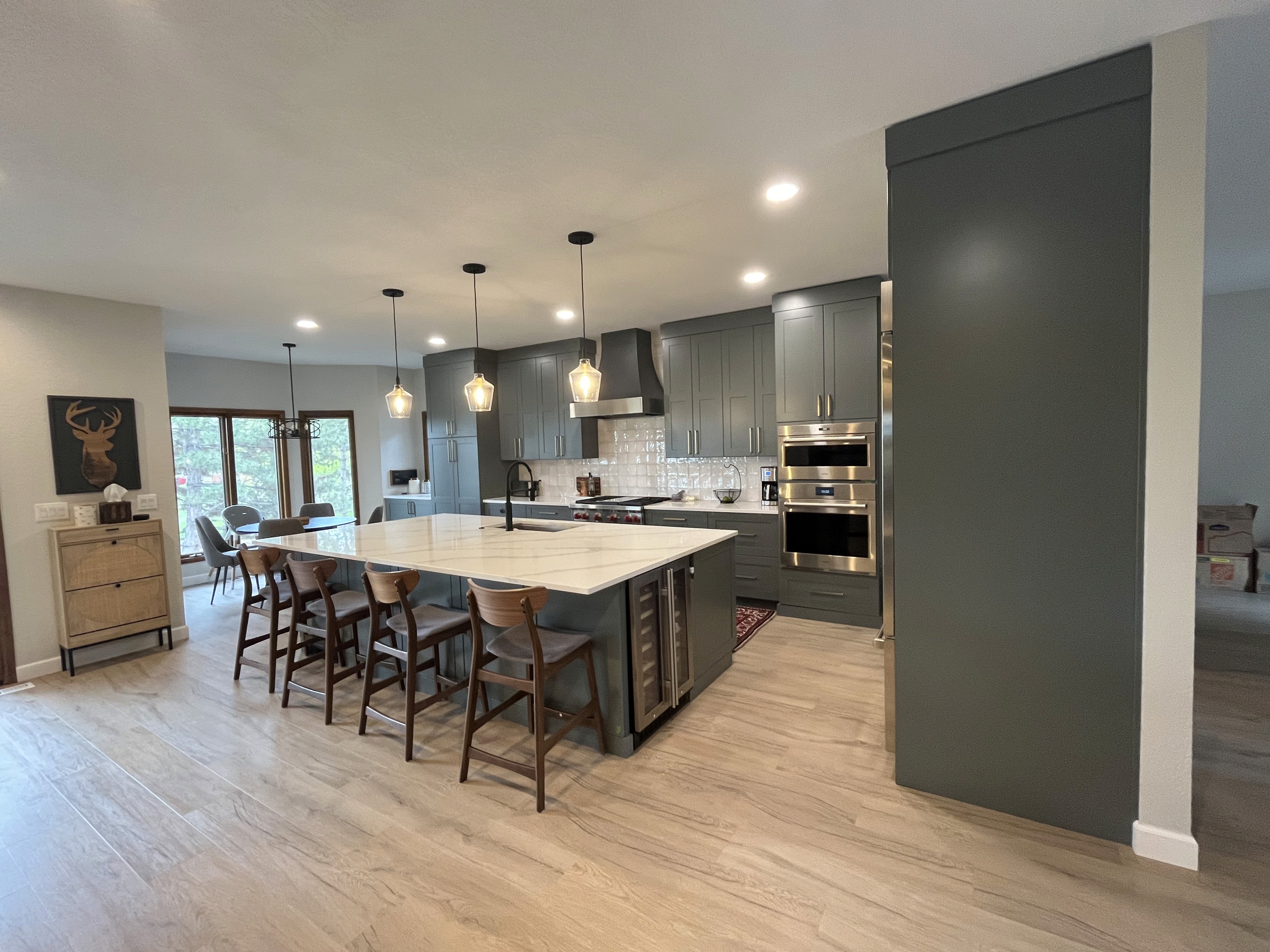 white and brown wooden table with chairs