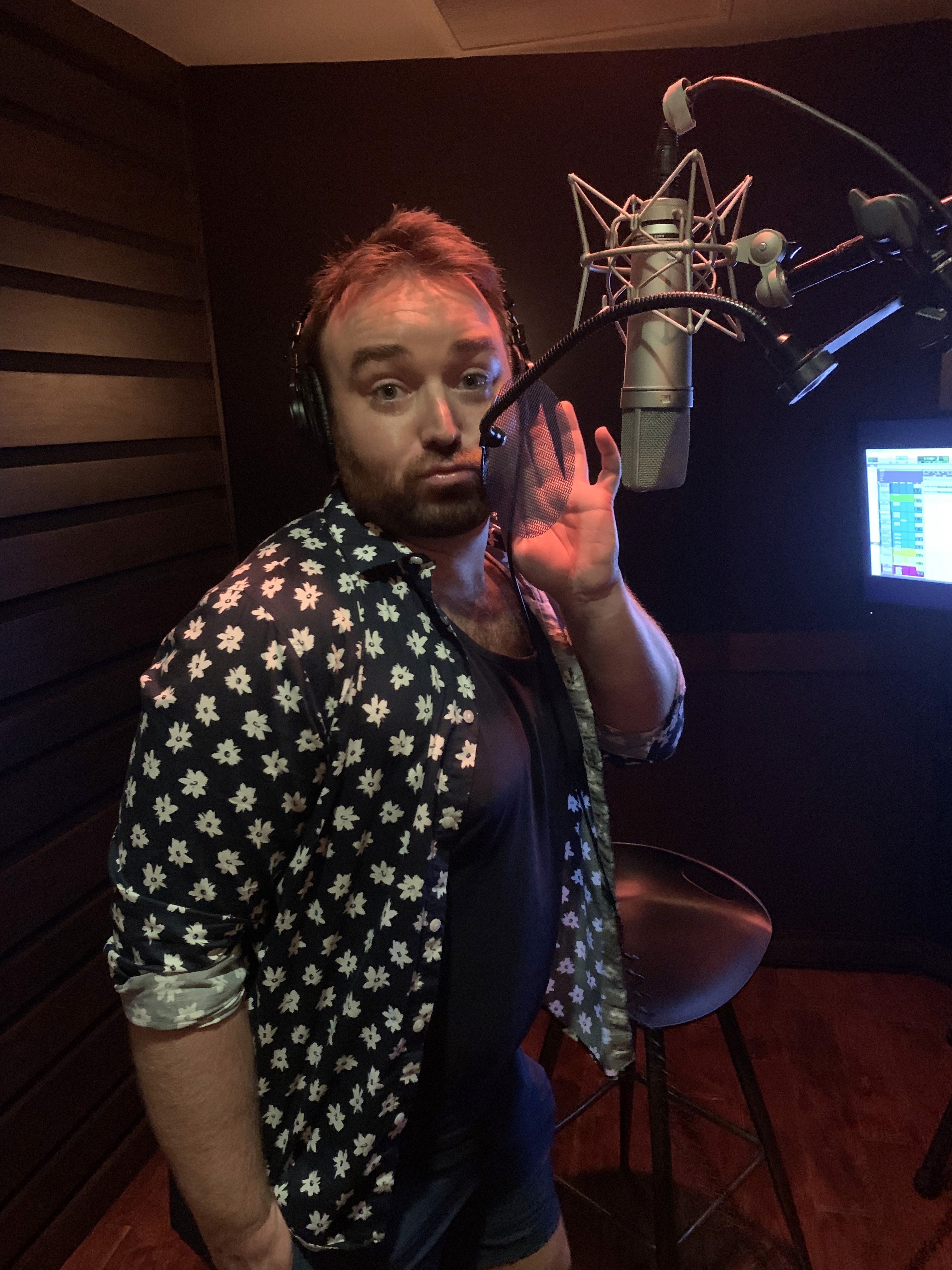 Laying down lines at the studio microphone