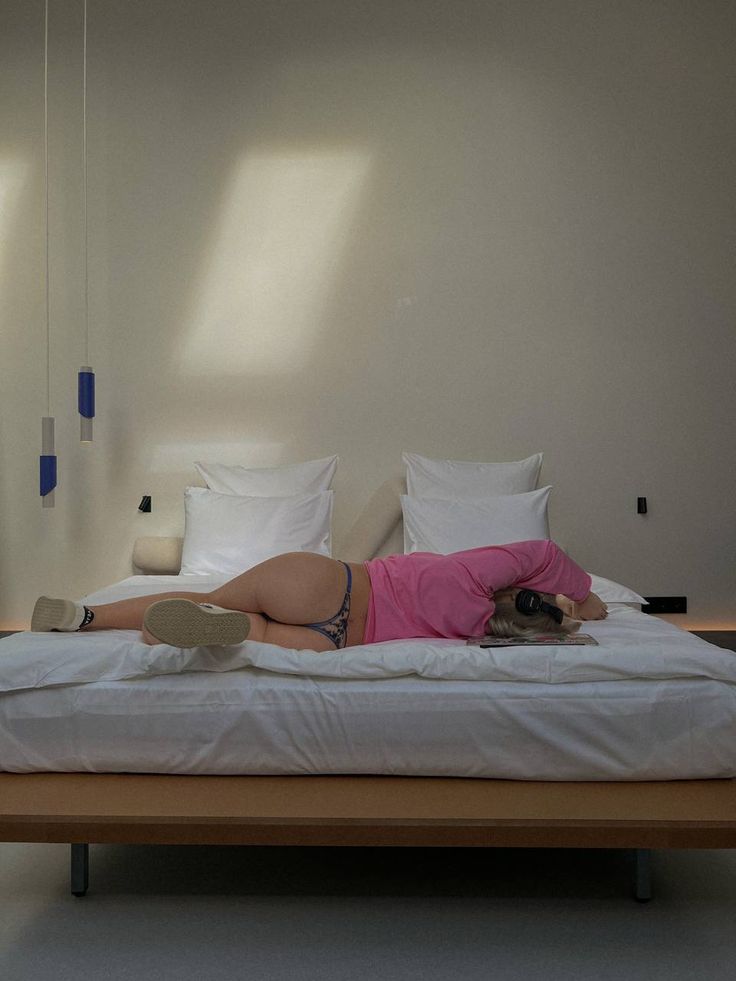 kids lying on a glass land and smiling