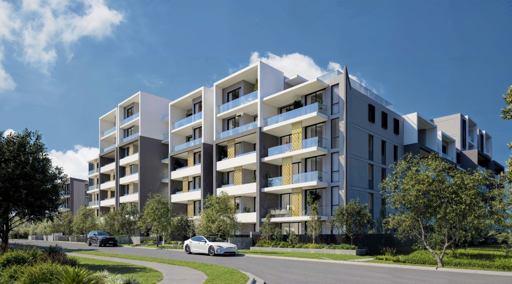 Architectural view of Kew Tallawong showcasing layered balconies, light-filled façades, and landscaped surrounds within a masterplanned residential setting.