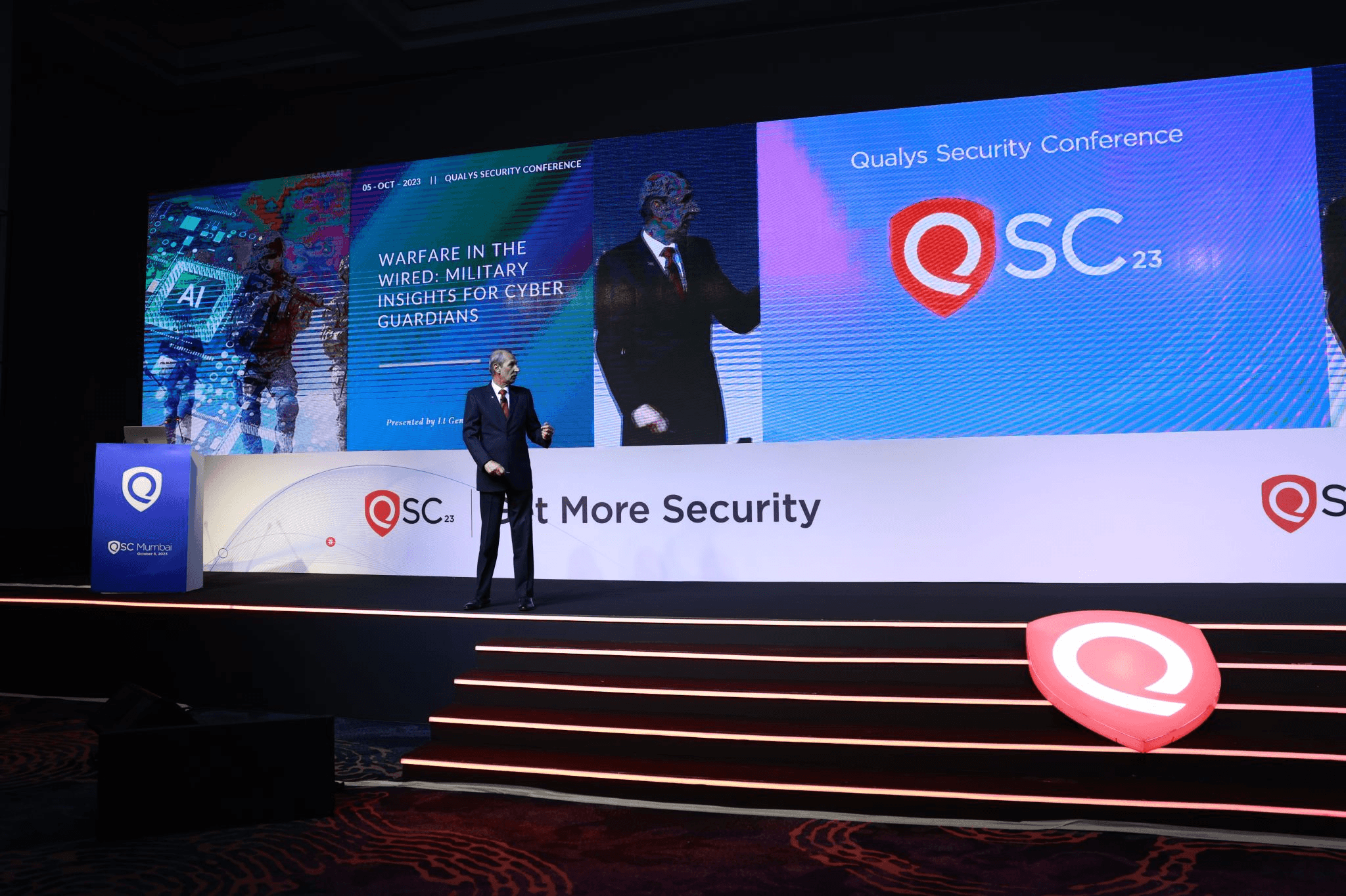 Barbed wire fence along a dry, overgrown path.