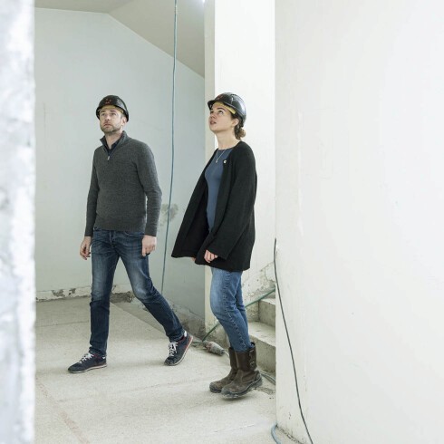 Group of people relaxing outdoors on a field or lawn