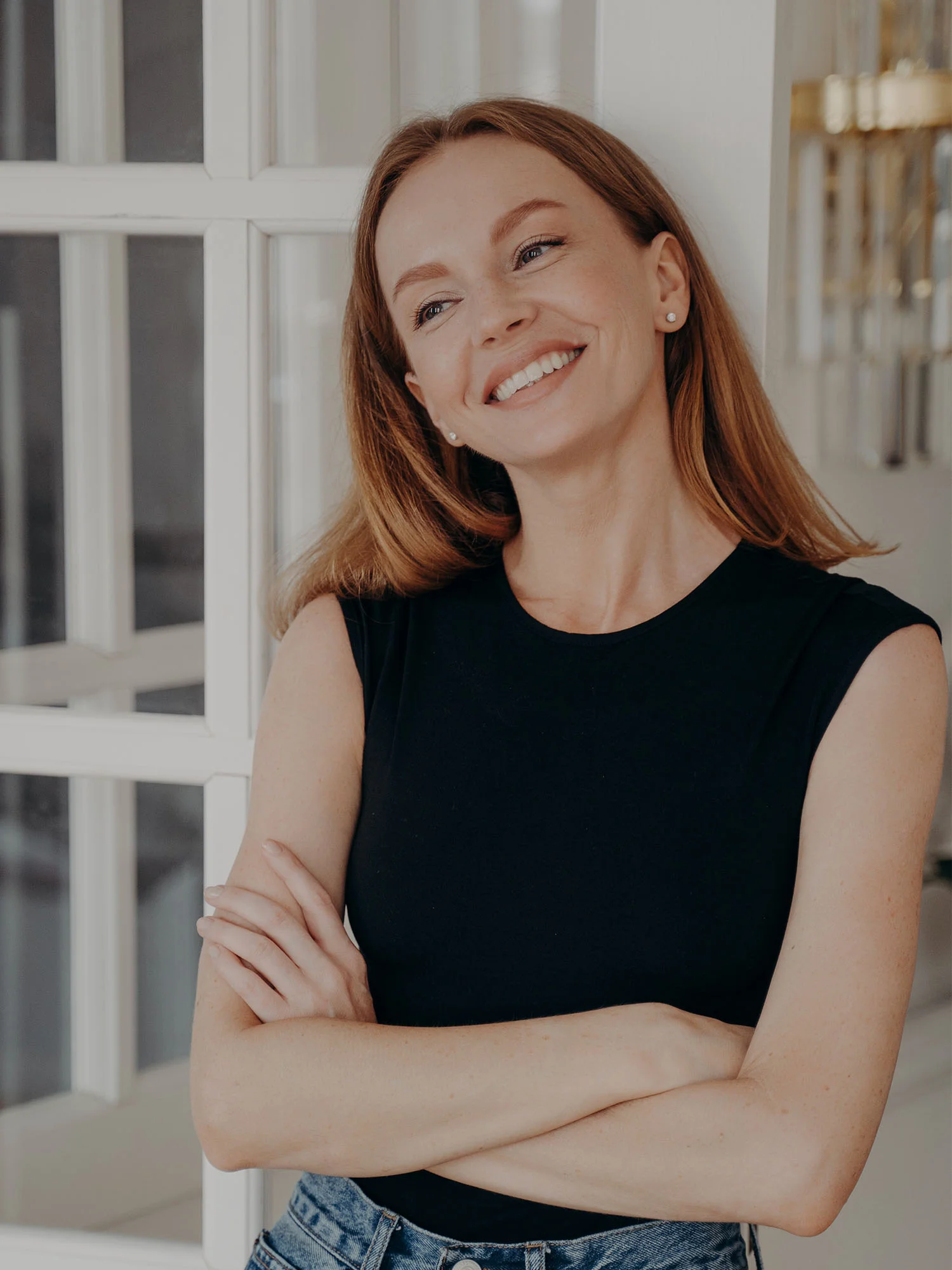 Smiling patient portrait representing a comfortable and confident oral surgery experience.