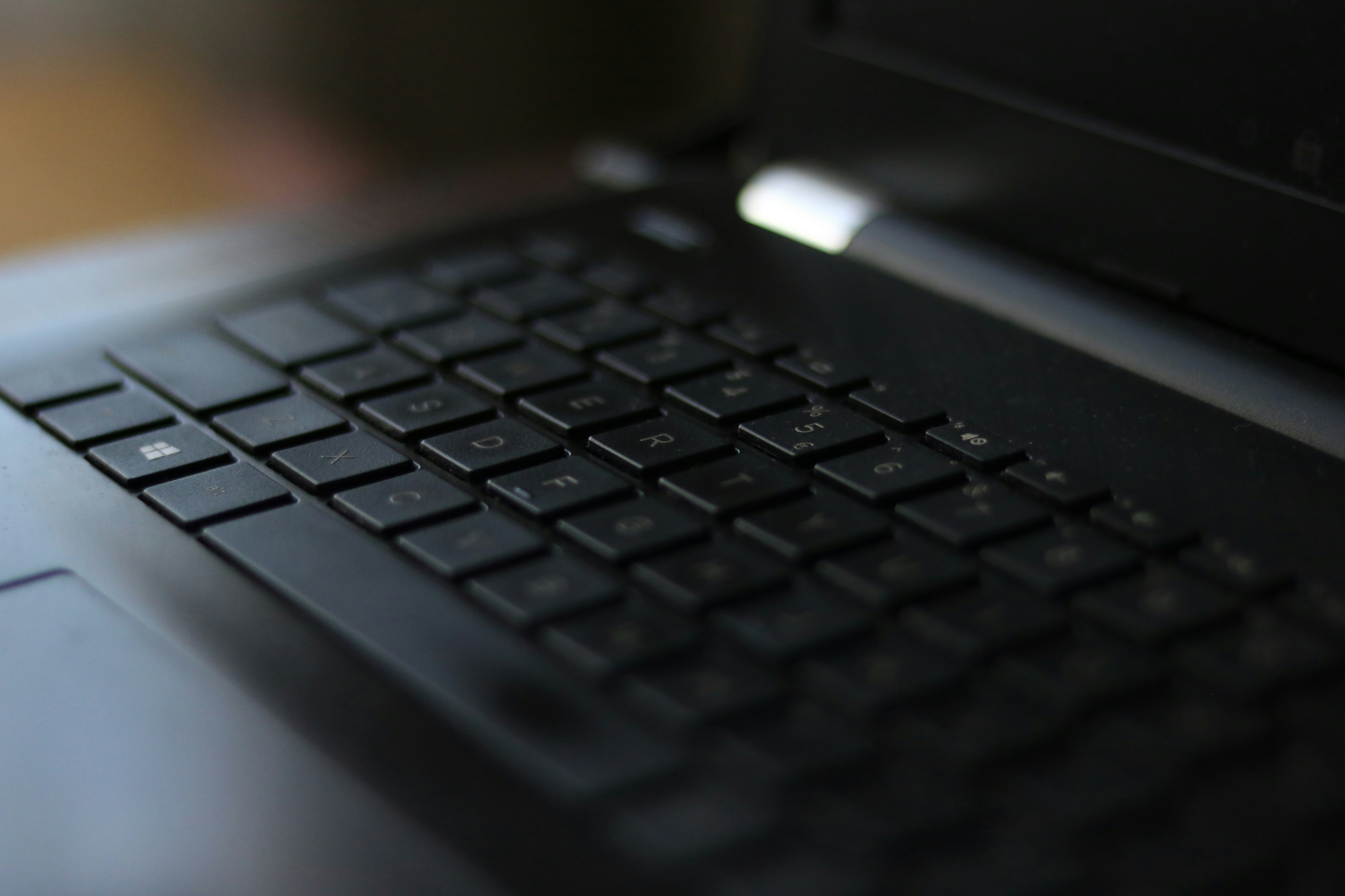 a close up of a black keyboard on a laptop