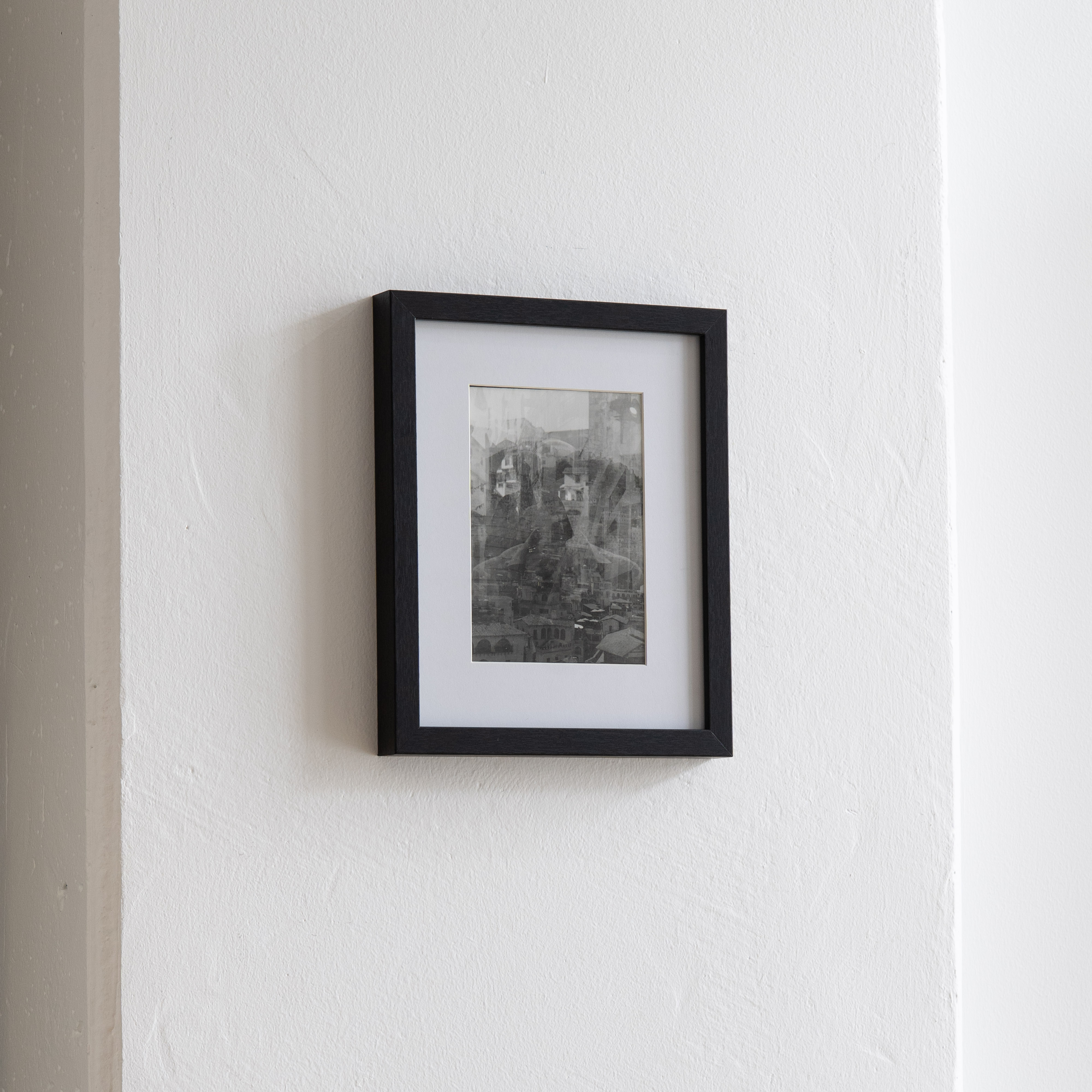 Darkroom prints drying on wire racks