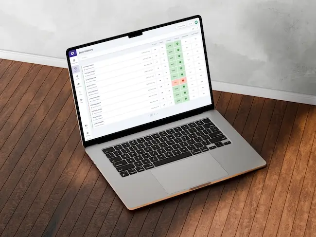 Laptop displaying DoesQA run history view