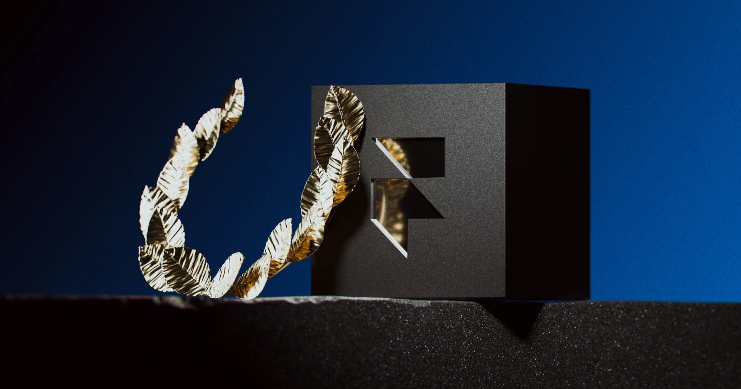 A fast black sports car races down the highway.