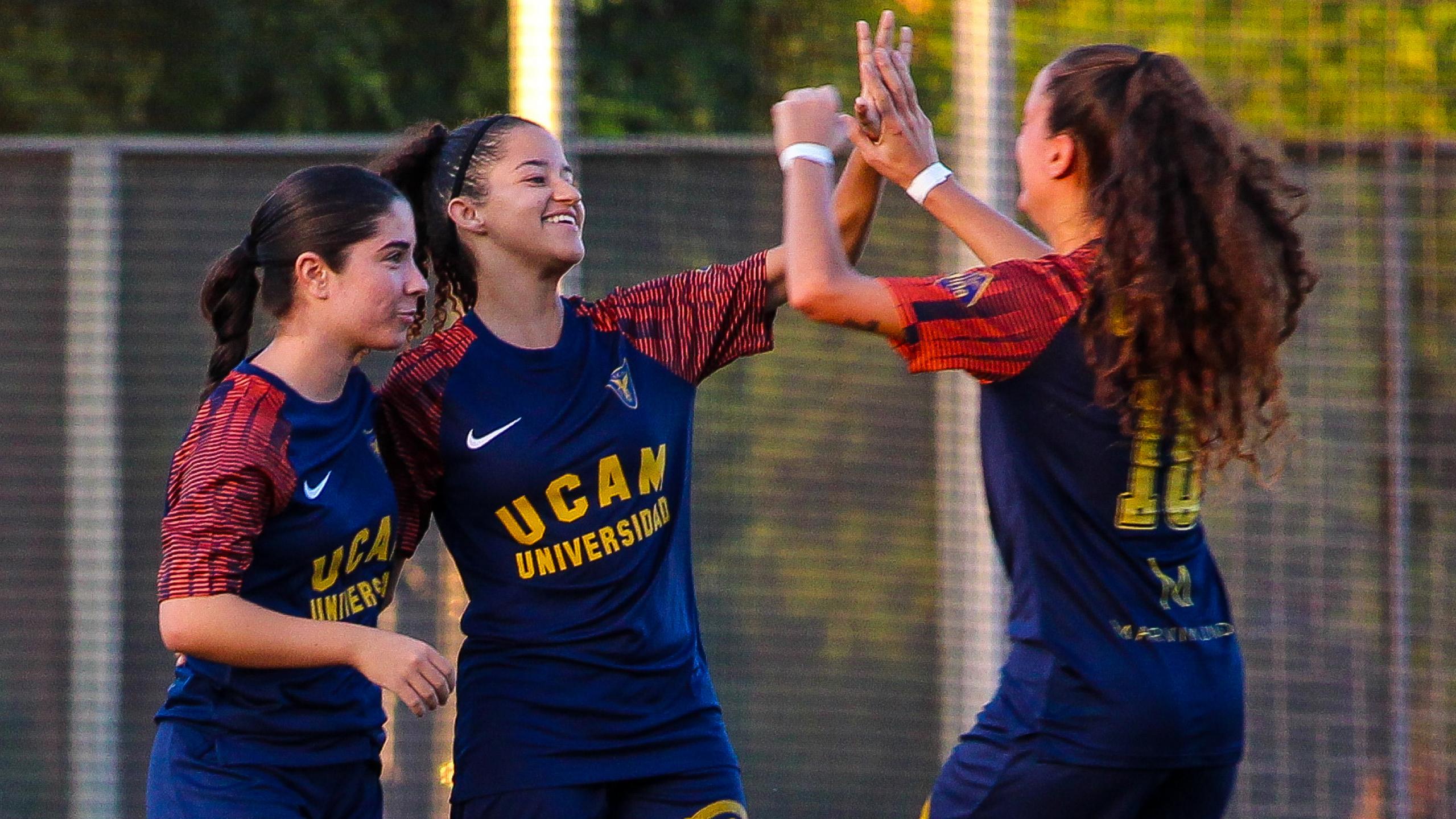 Players from the UCAM International Football Team celebrating a goal during a friendly match on the Murcia campus | UCAM Catholic University of Murcia
