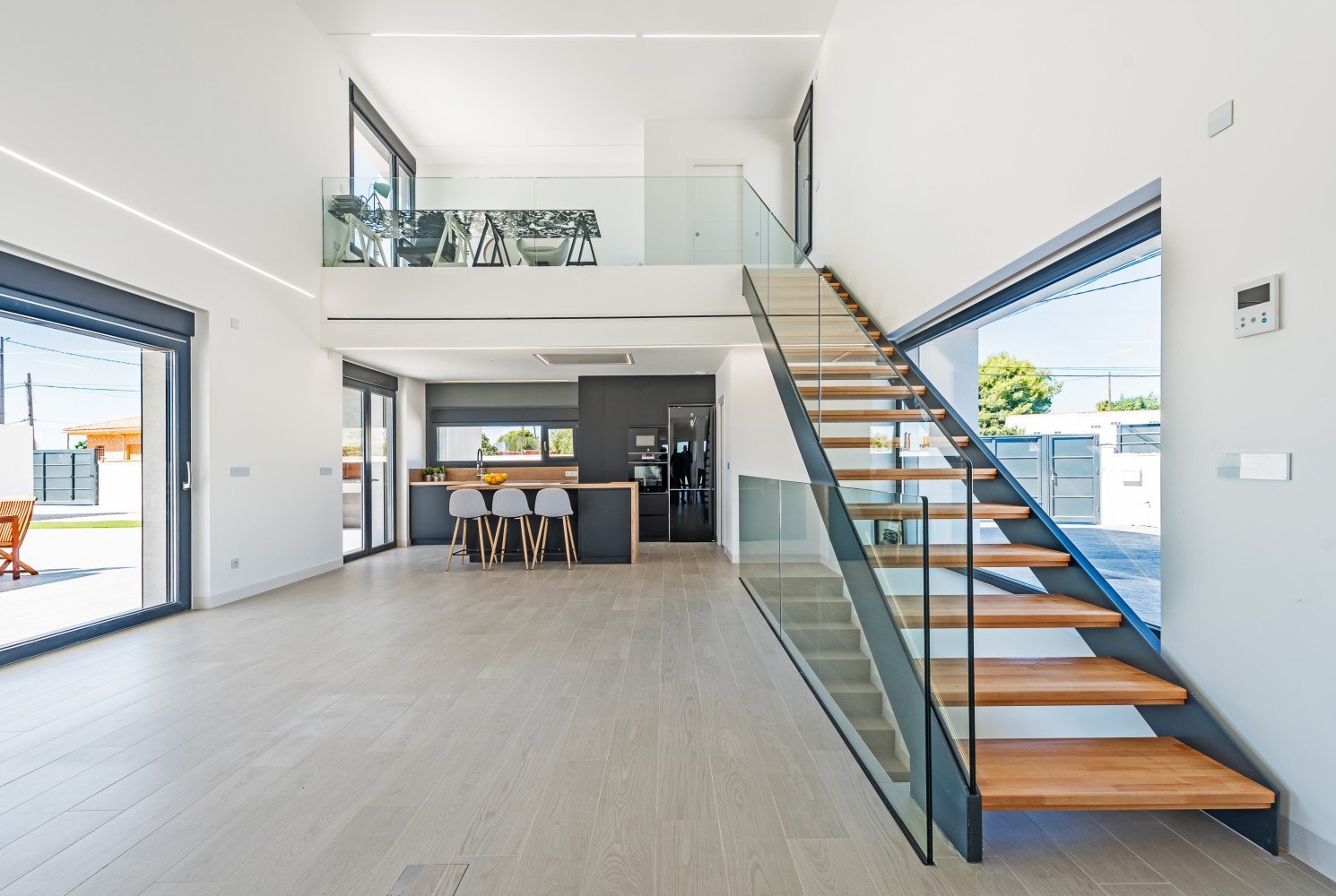 kids lying on a glass land and smiling