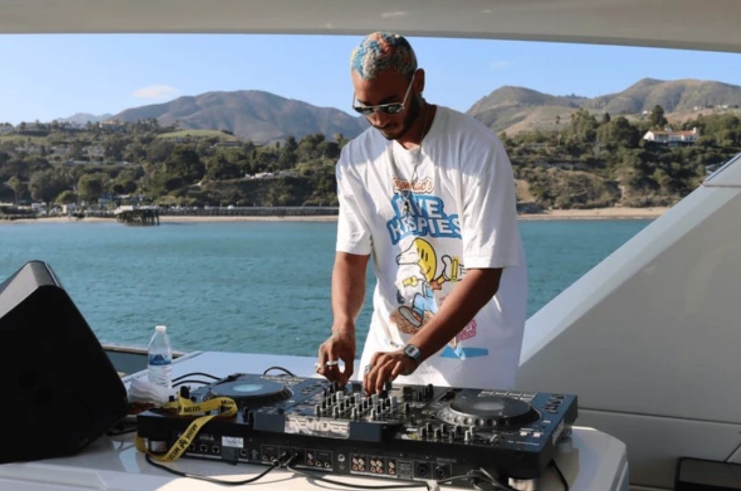 Group of people standing in a grassy field