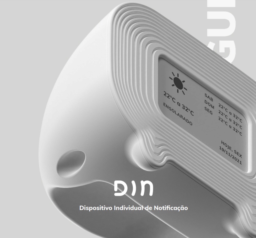 Smiling young man with short hair poses against a dark background, wearing a green button-up shirt.