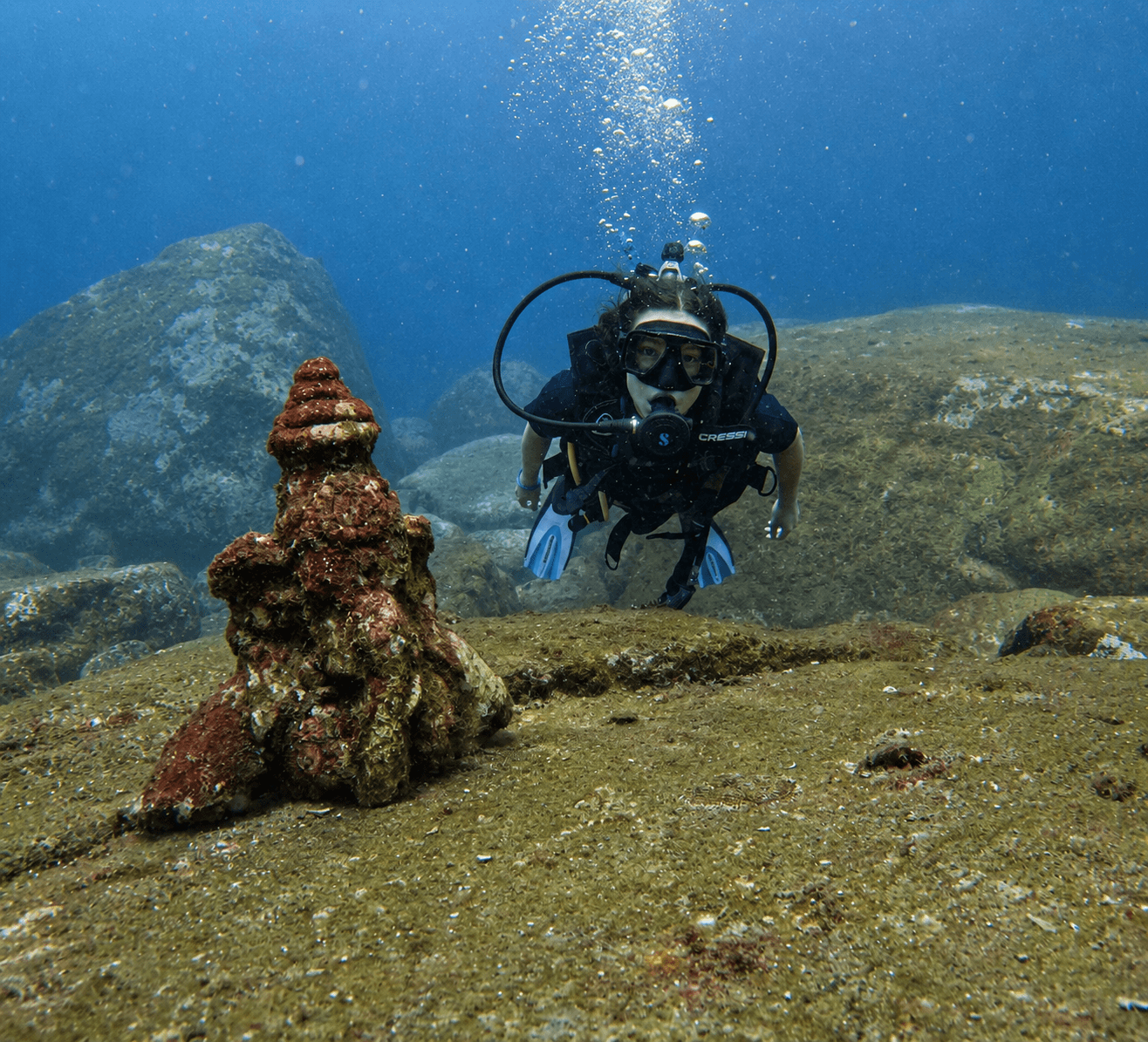 Blue Water Sports diver exploring Swami Rock underwater formations in Trincomalee