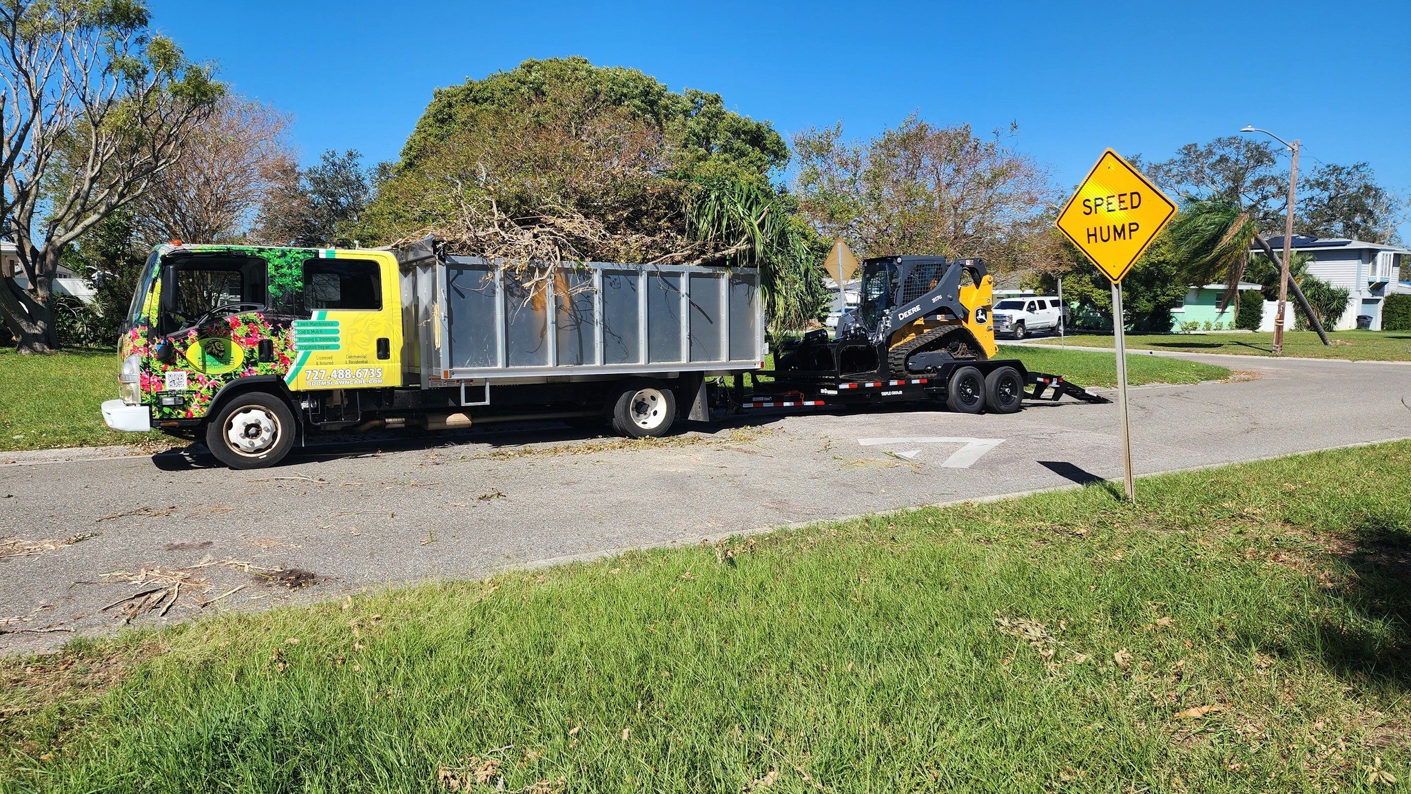 Free Framer Template - Two young men converse in a cozy, rustic setting with wooden decor, one on a laptop and the other gesturing.