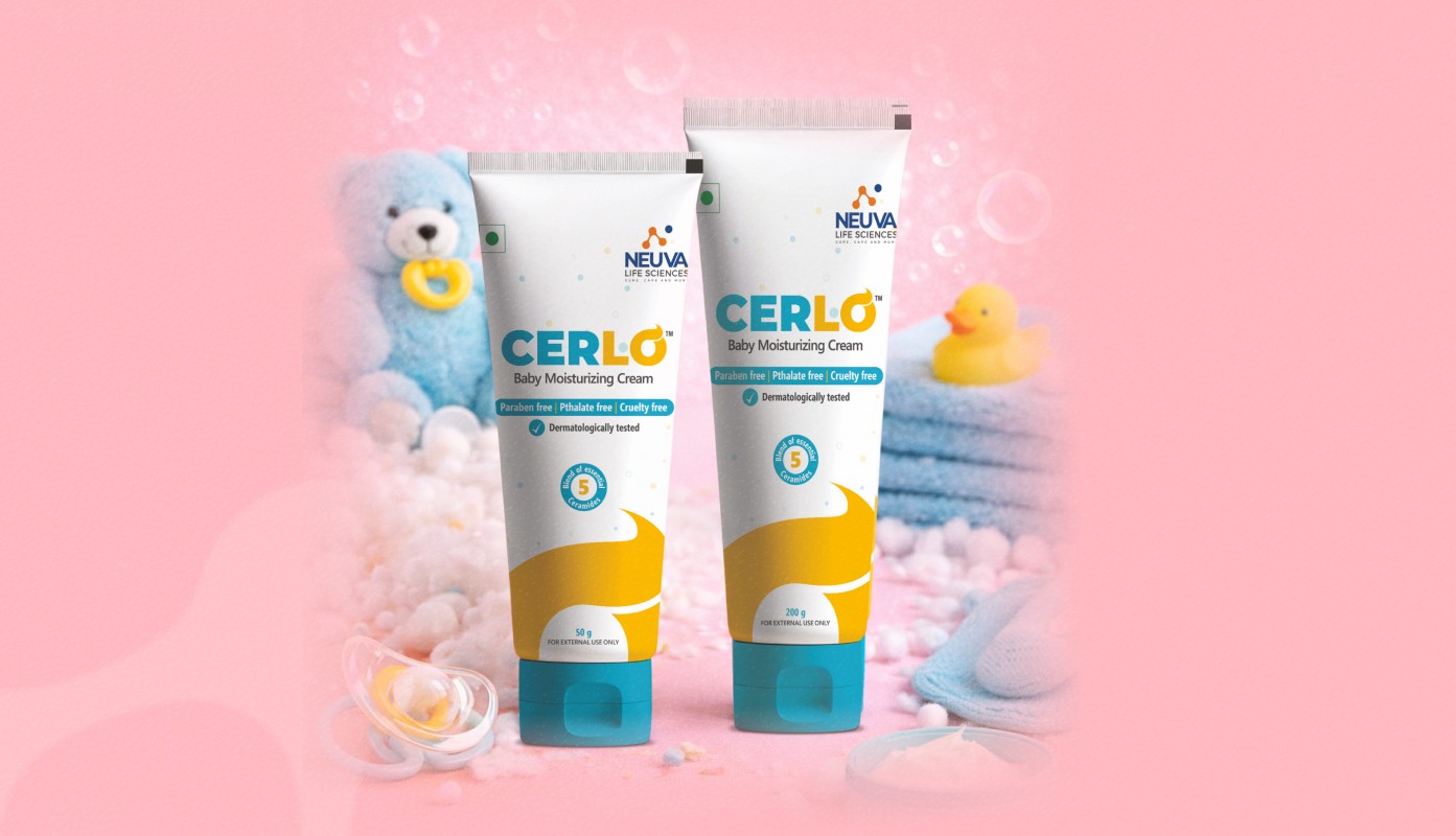 A couple of kids that are sitting in the grass