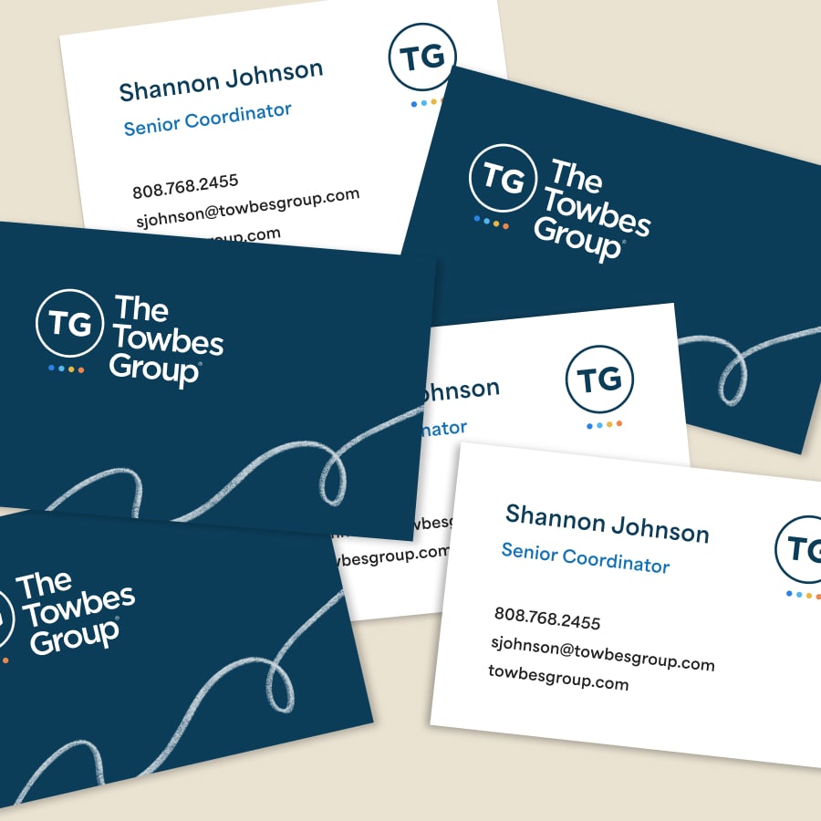 Various Towbes Group business cards.