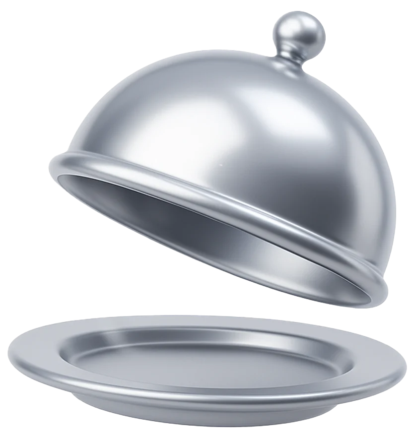 A shiny silver cloche partially lifted off a plate, suggesting a dish is being served.