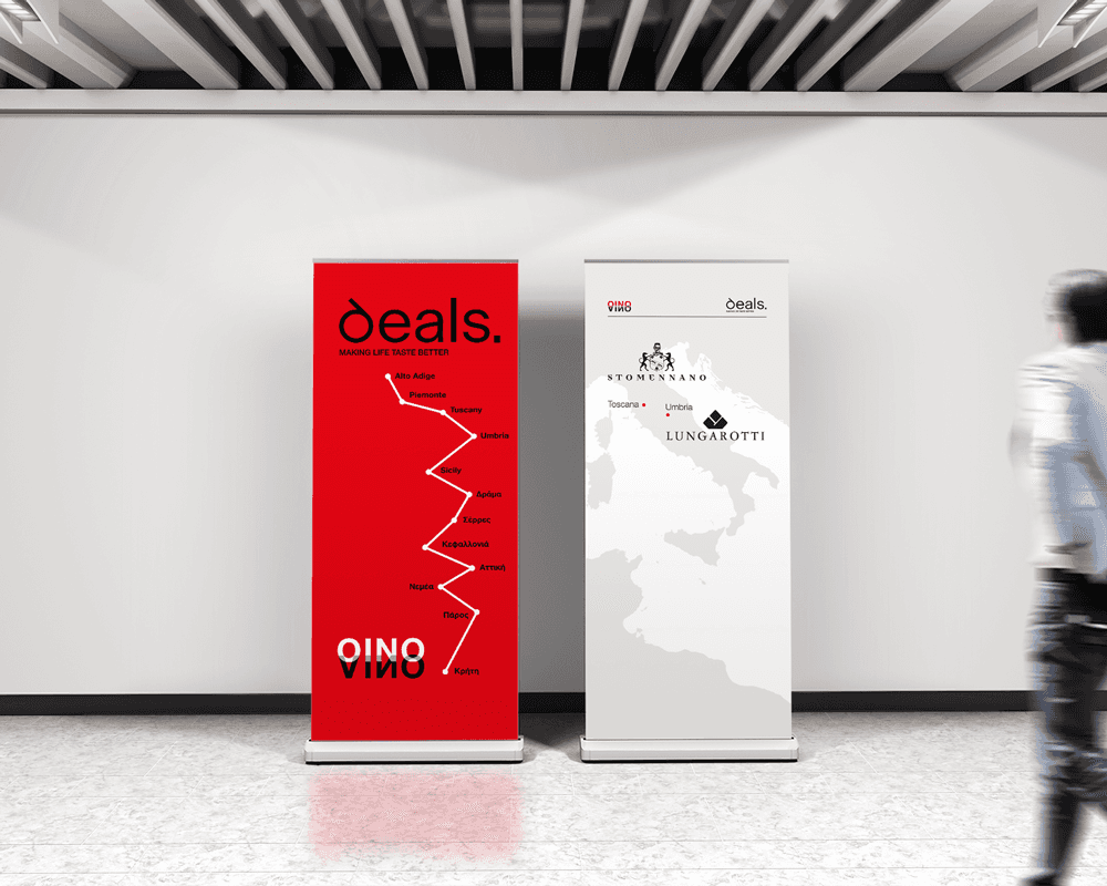 Exhibition signage design for Deals S.A. featuring the bold OINO VINO visual identity