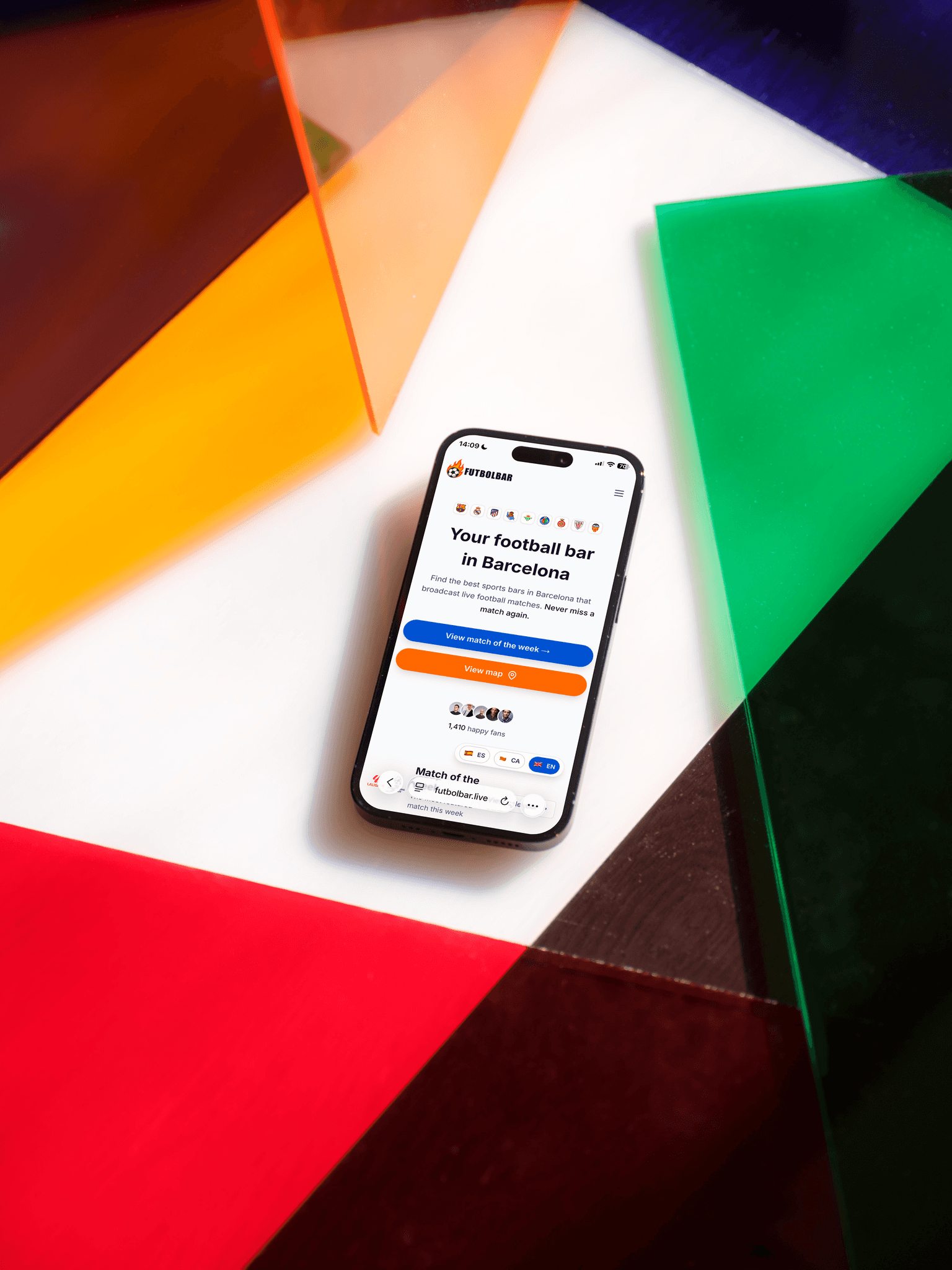 Smartphone displaying the FutbolBar app interface with colorful geometric background and modern UI elements