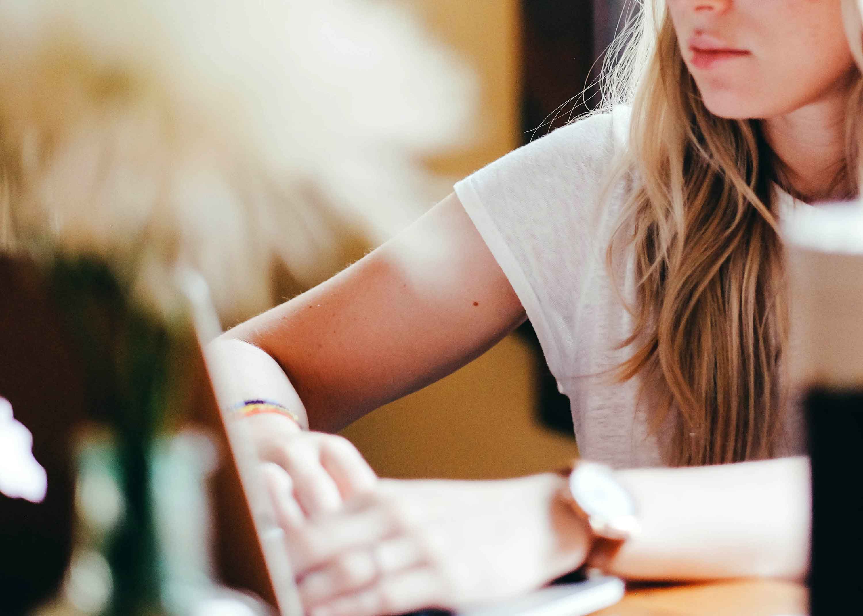 woman looking at laptop