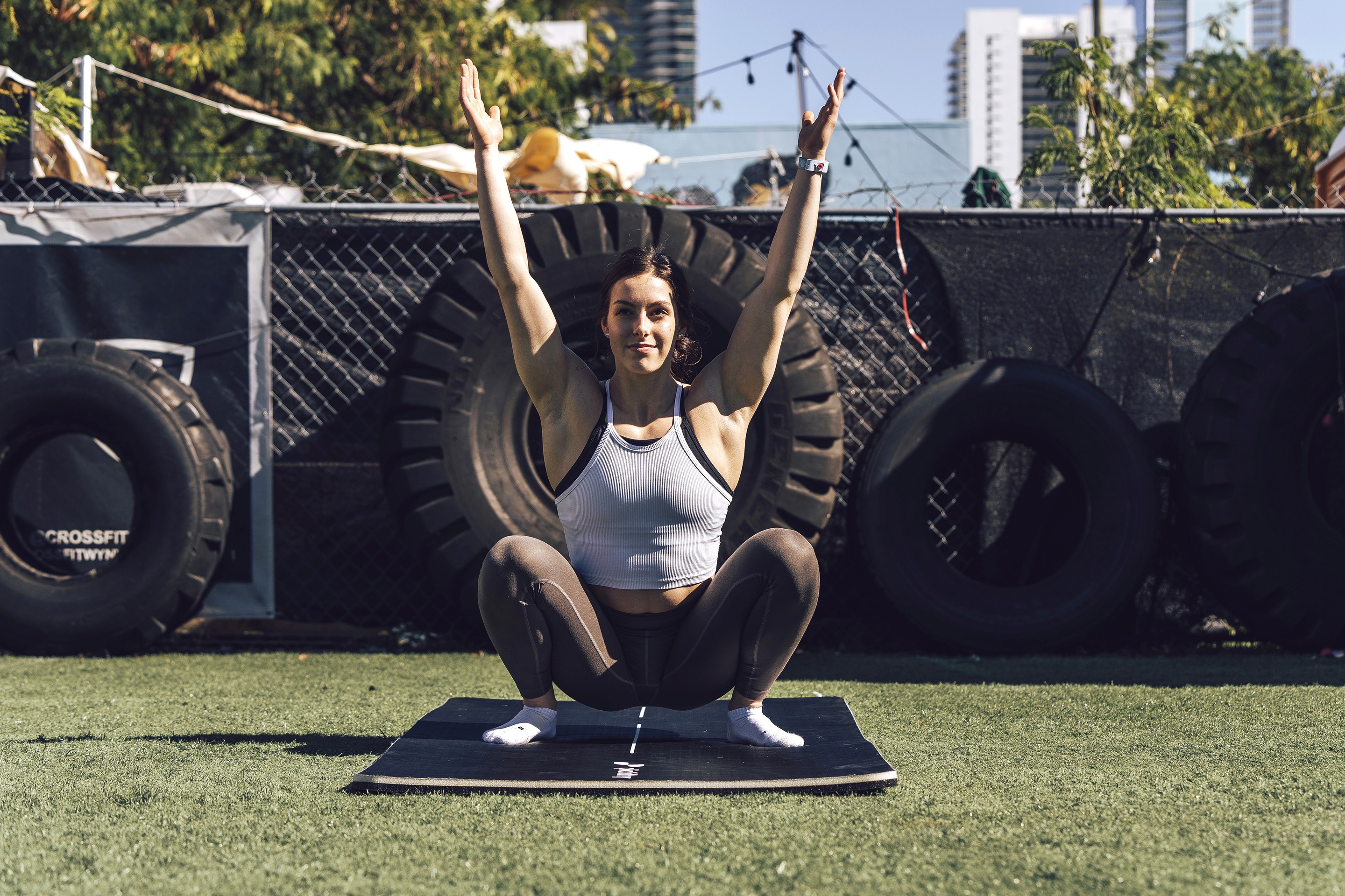 person in yoga position - How to Work Out When Tired