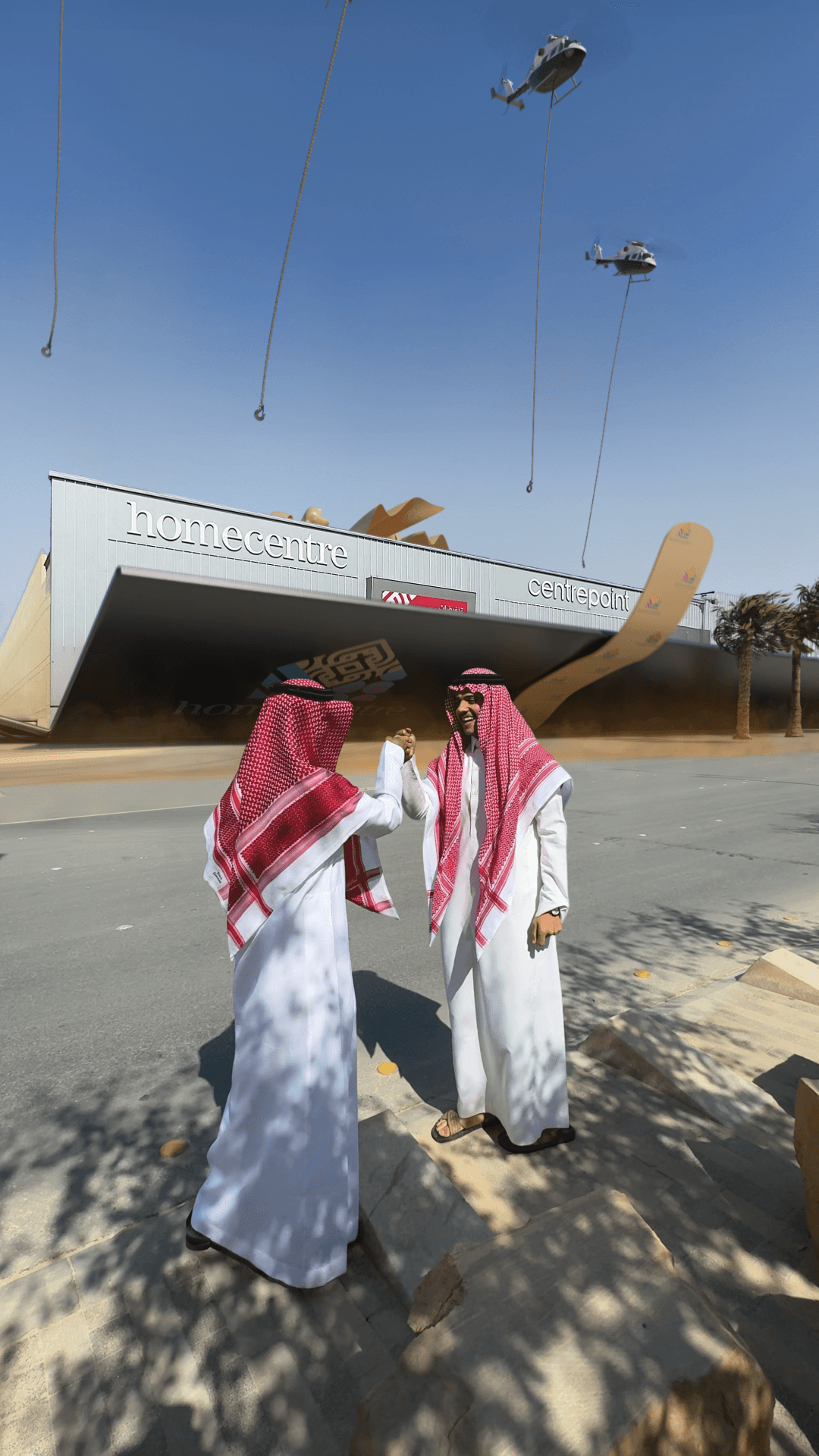 A mid-process composite layering the digital gift box over the physical building