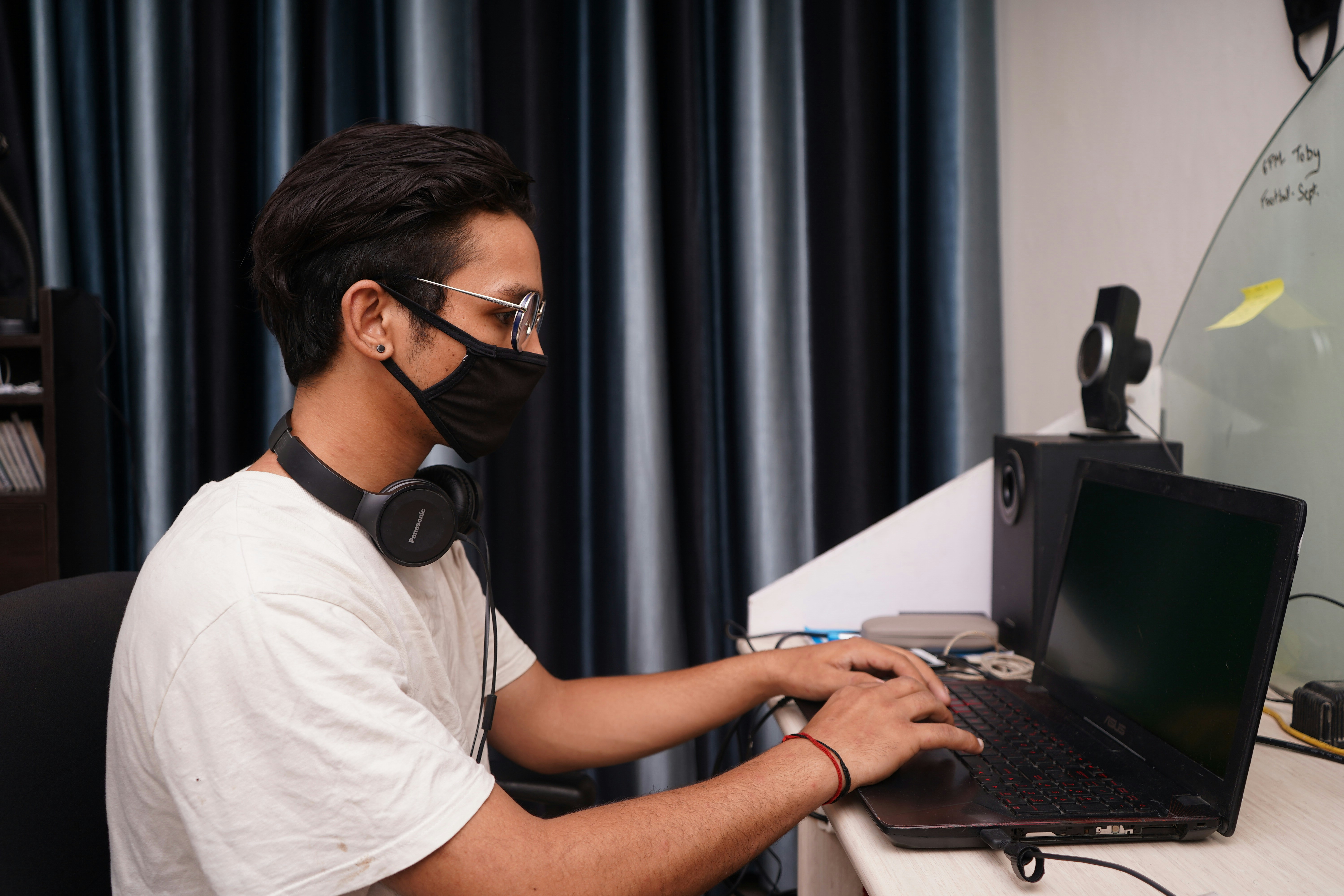person infront of computer - Music Marketing Agencies