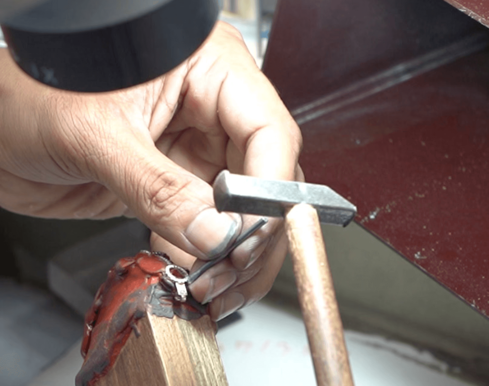 Skilled setter at Lab Grown Dreams making a ring.