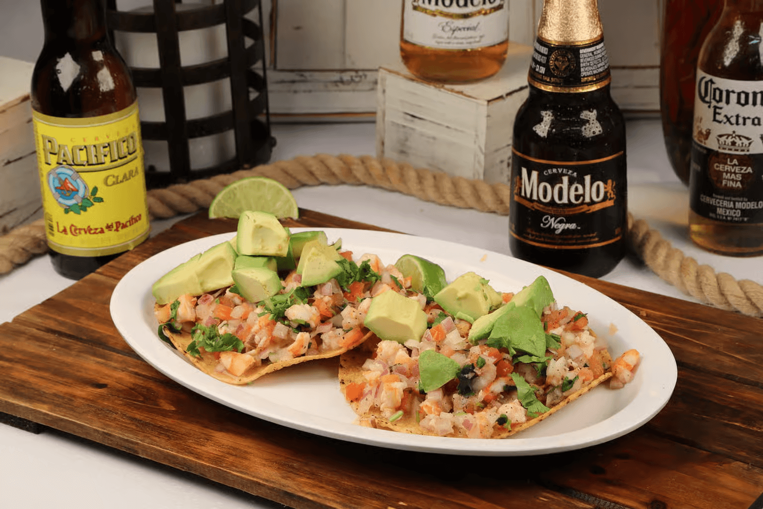 Delicious pollo asado from Rodeo Mexican Grill, featuring juicy grilled chicken paired with fresh guacamole, rice, and a side of their famous beans.