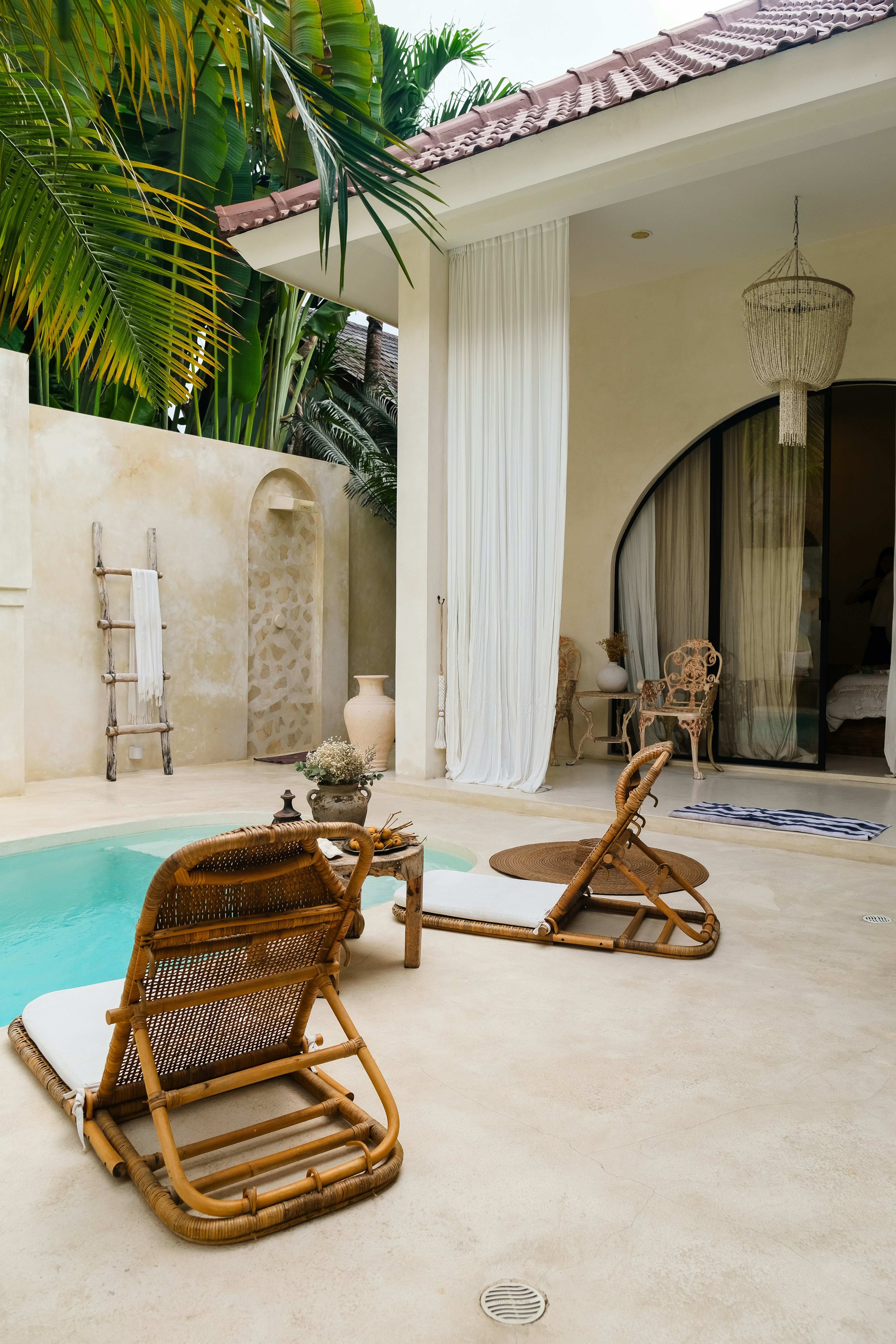 Courtyard with a fountain and lounge area.