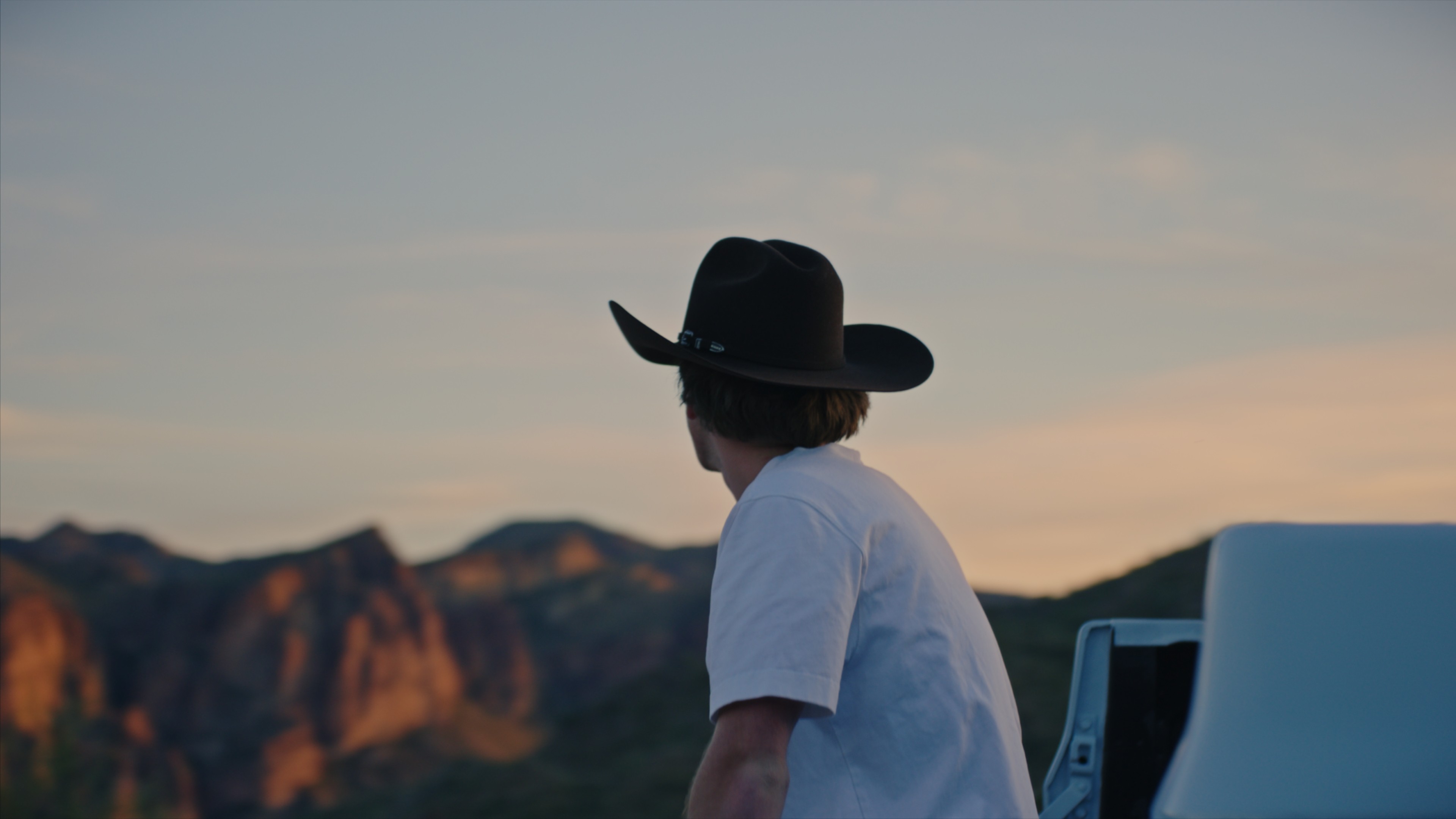 A shot of a man holding office files