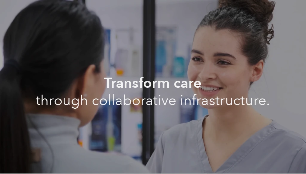 An Image of a nurse talking to a patient, with the text 'transform care through collaborative infrastructure inlayed