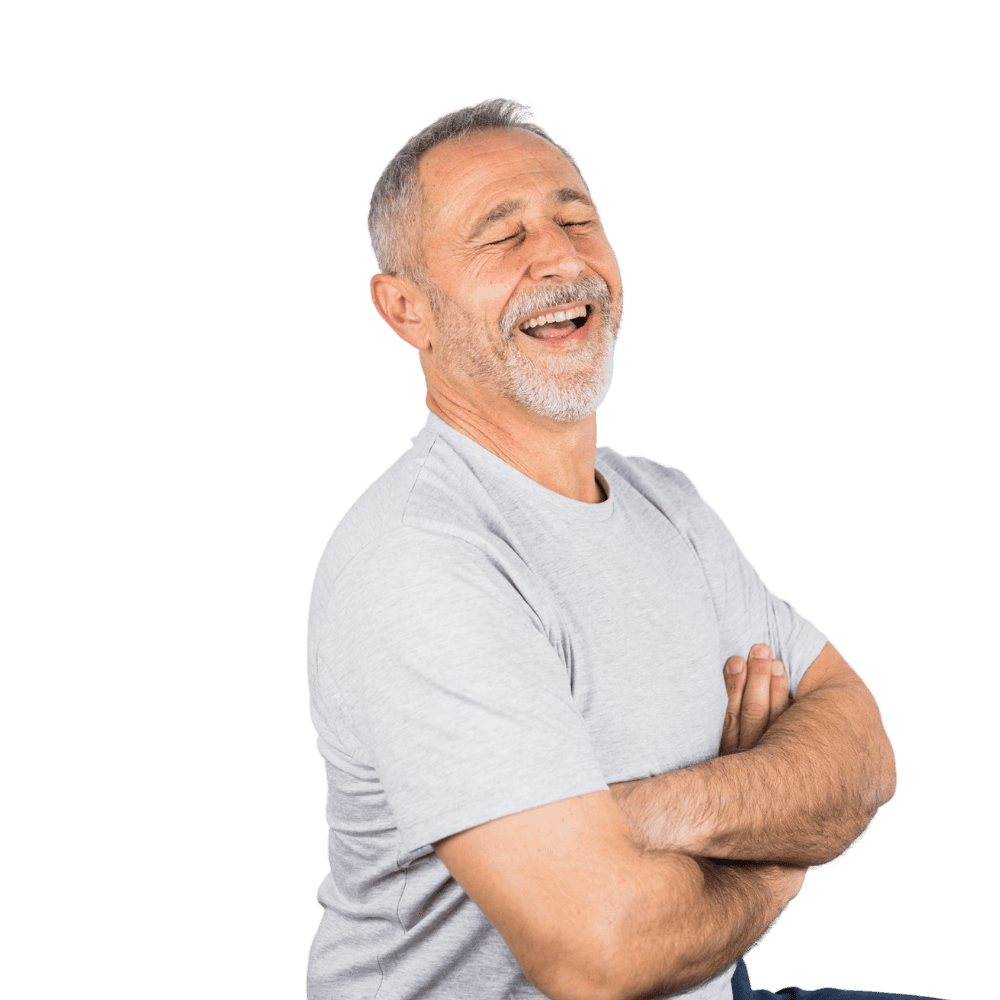 Smiling older man with arms crossed, expressing confidence and satisfaction with physiotherapy care.