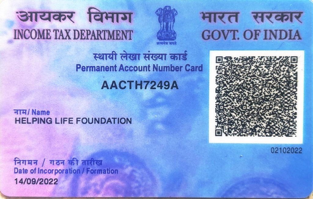 Three children jumping in burlap sacks during a race.