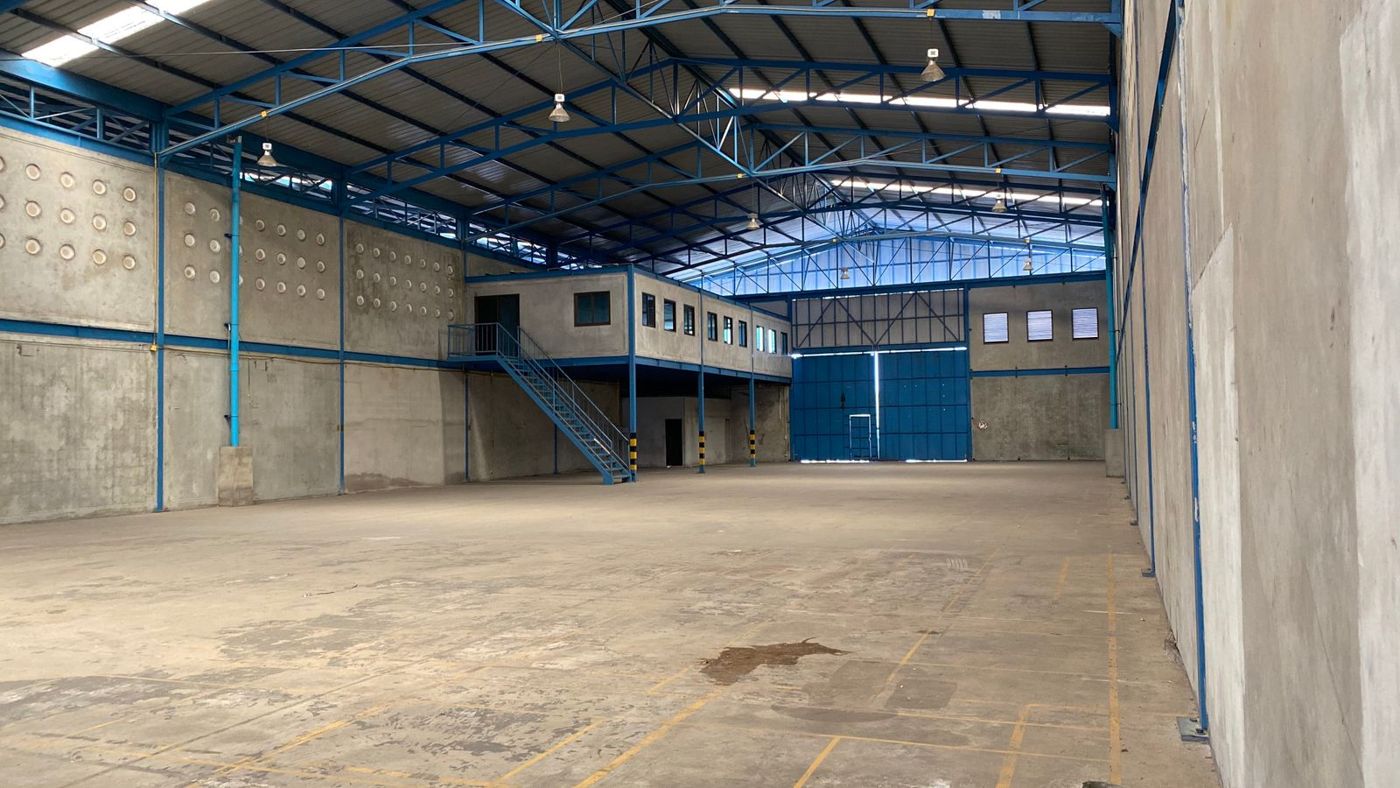 Large empty warehouse ready for cleaning